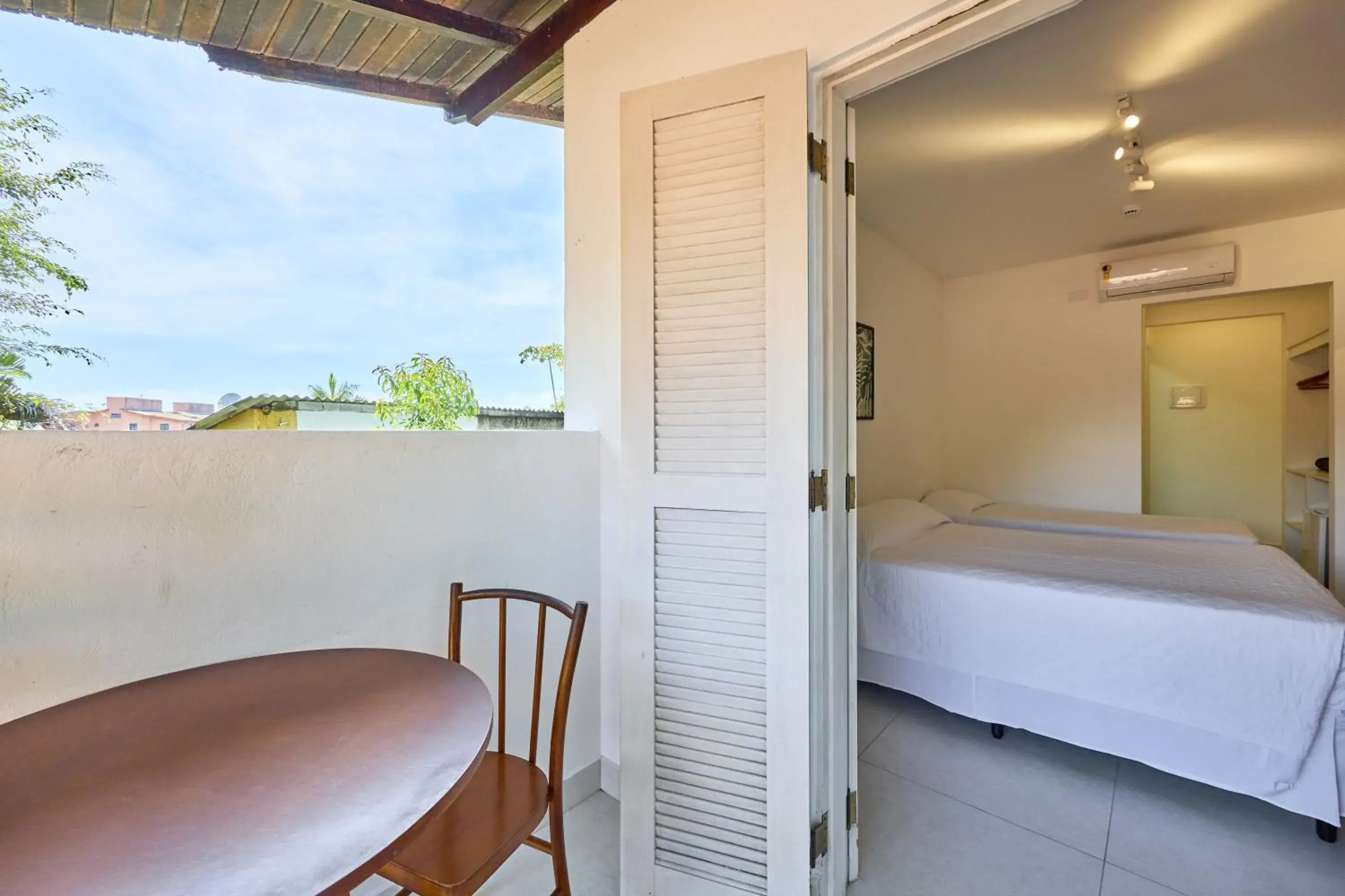 Balcony/Terrace, Bed in Hotel Coquille Balcony/Terrace, Bed in Hotel Coquille