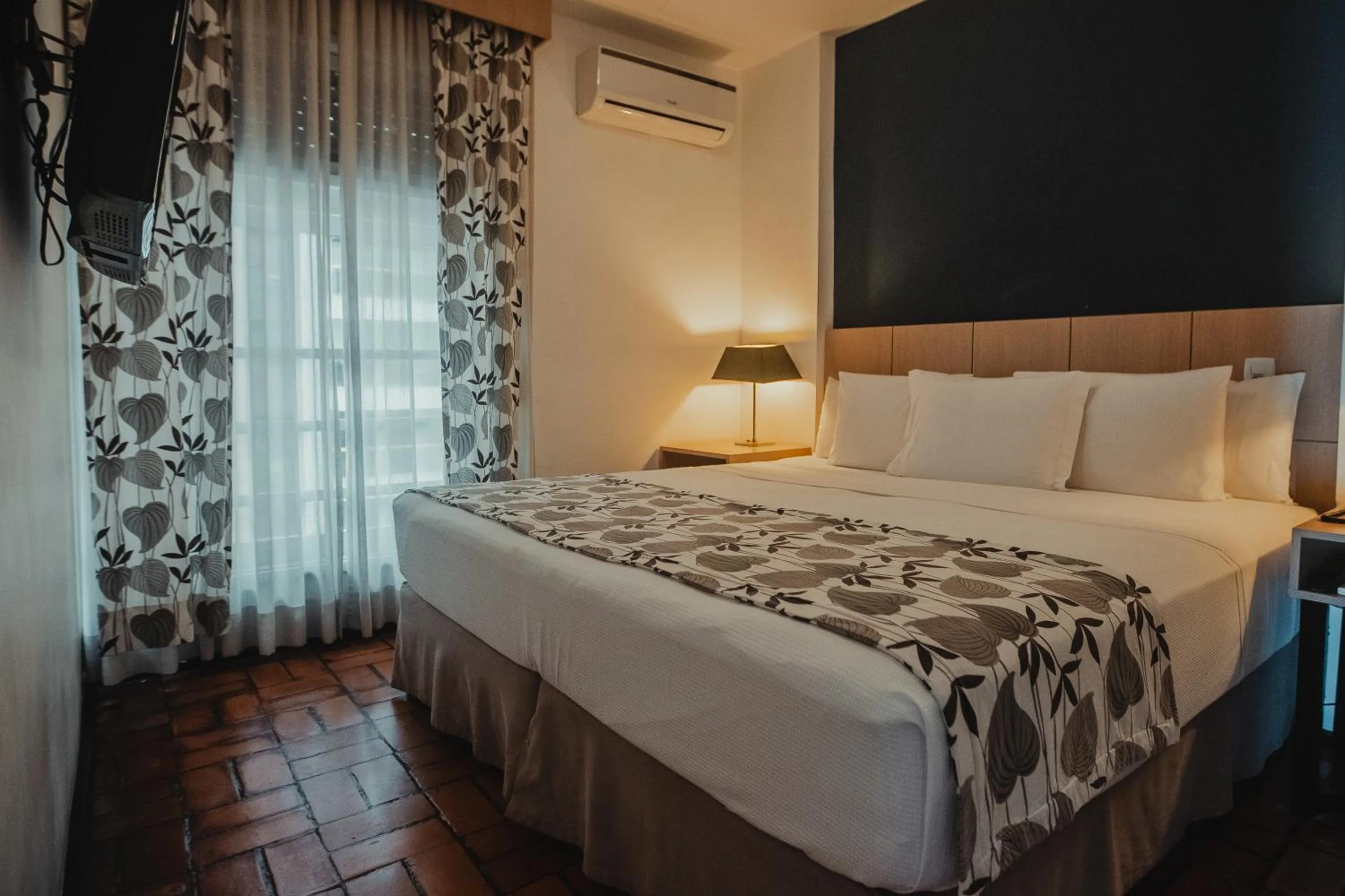 Photo of the whole room, Bed in Ferraretto Guarujá Hotel & Spa