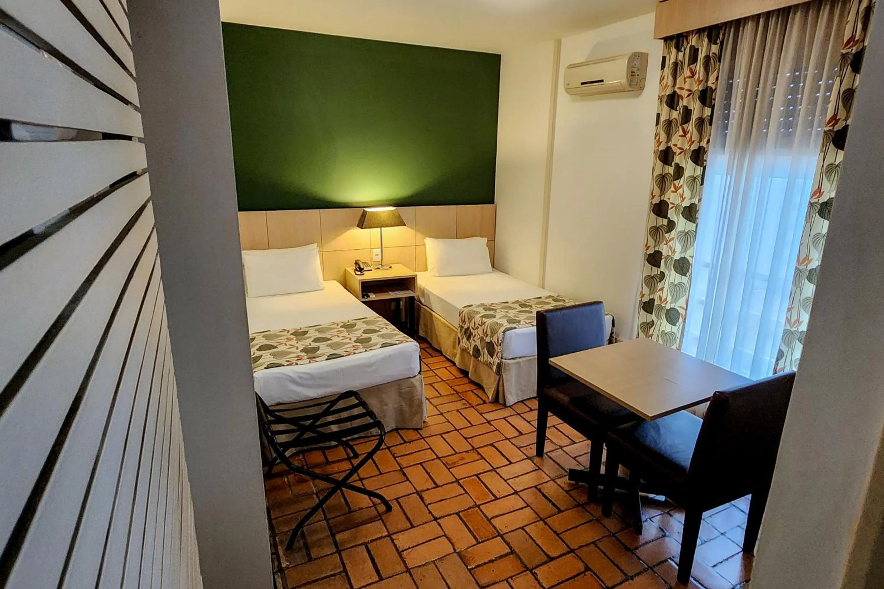 Bed in Ferraretto Guarujá Hotel & Spa