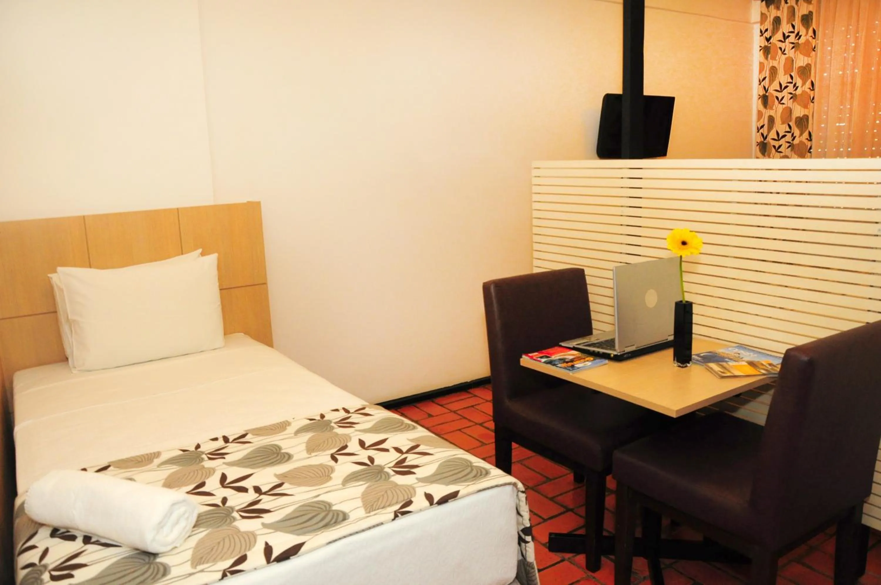 Photo of the whole room, Bed in Ferraretto Guarujá Hotel & Spa