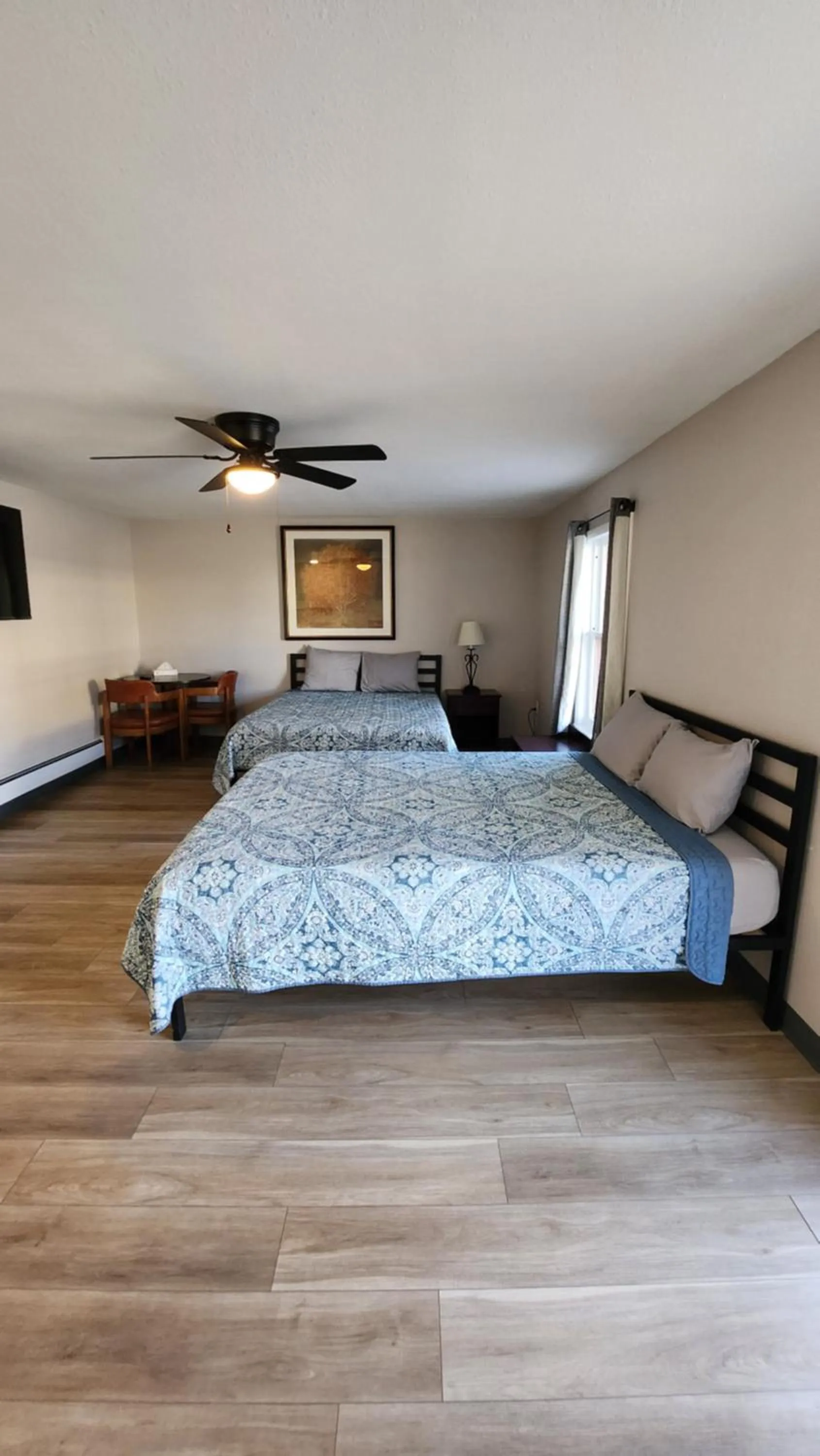 Bed in Golden Arrow Motel