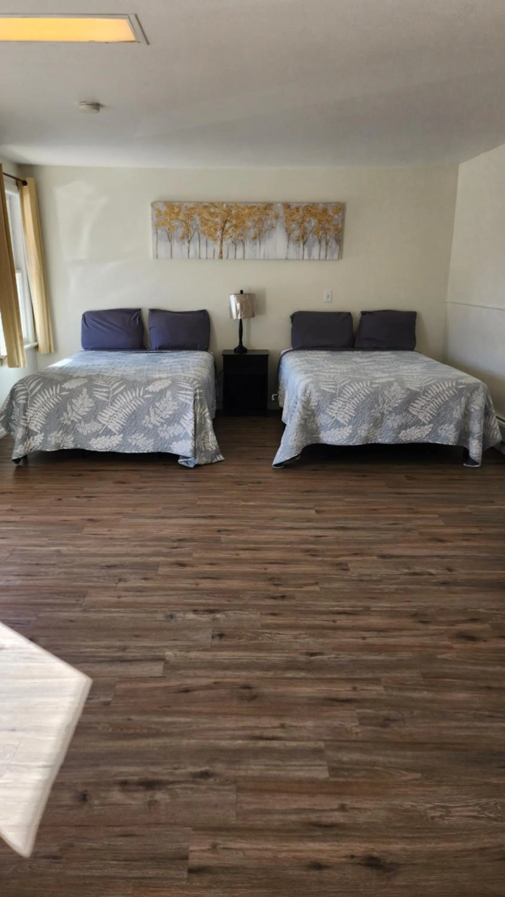 Bed in Golden Arrow Motel