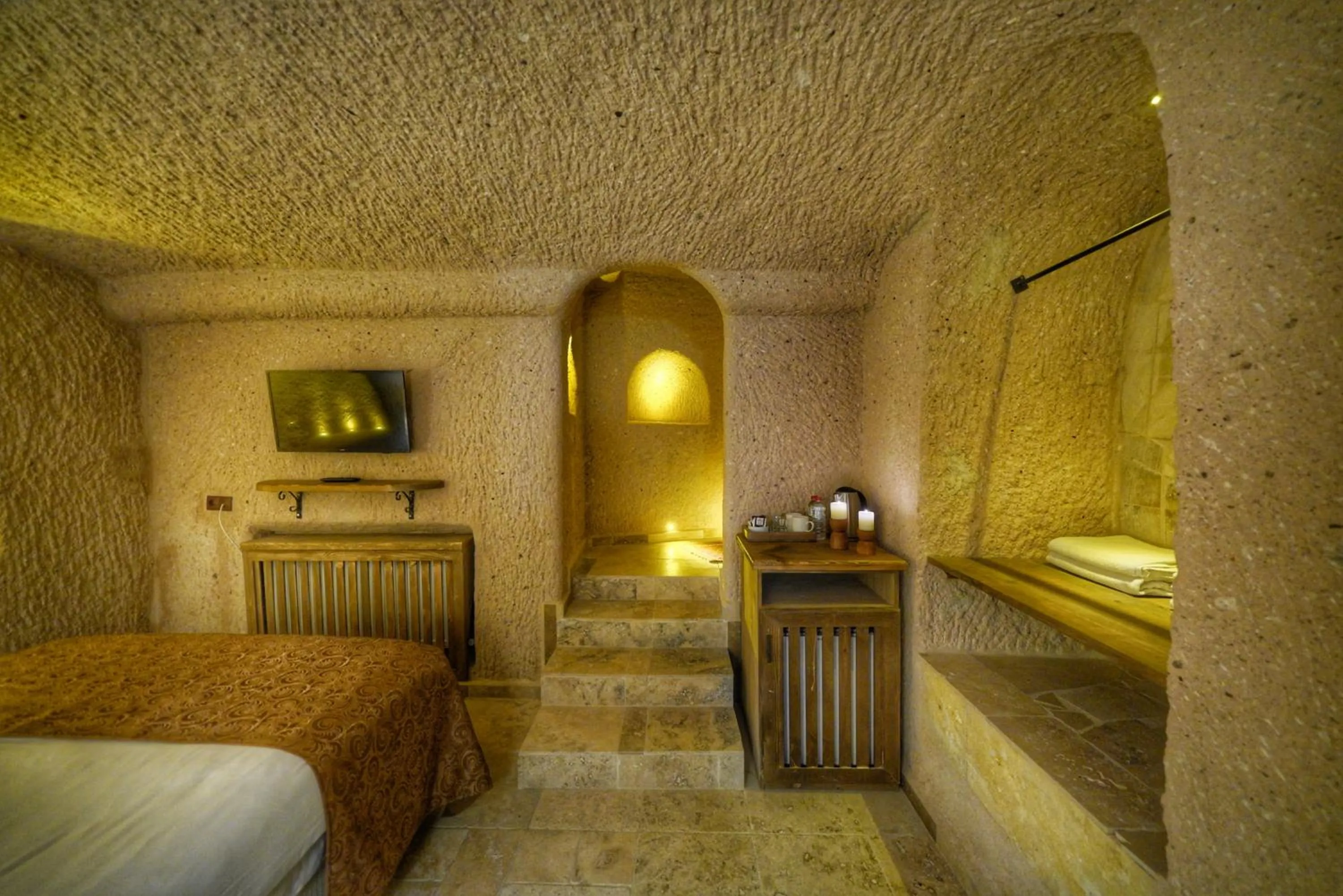 Bed in Takaev Cave House