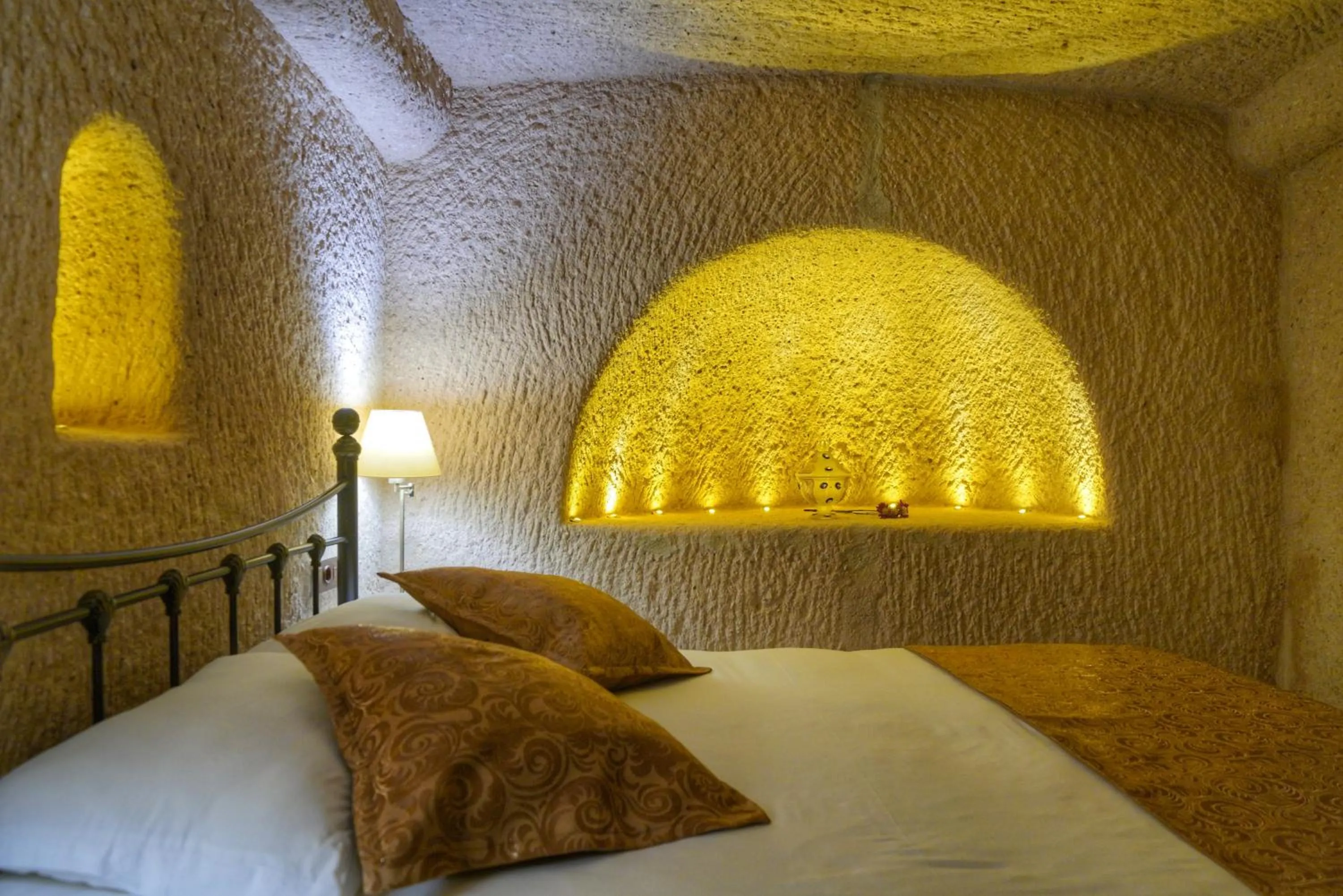 Bed in Takaev Cave House