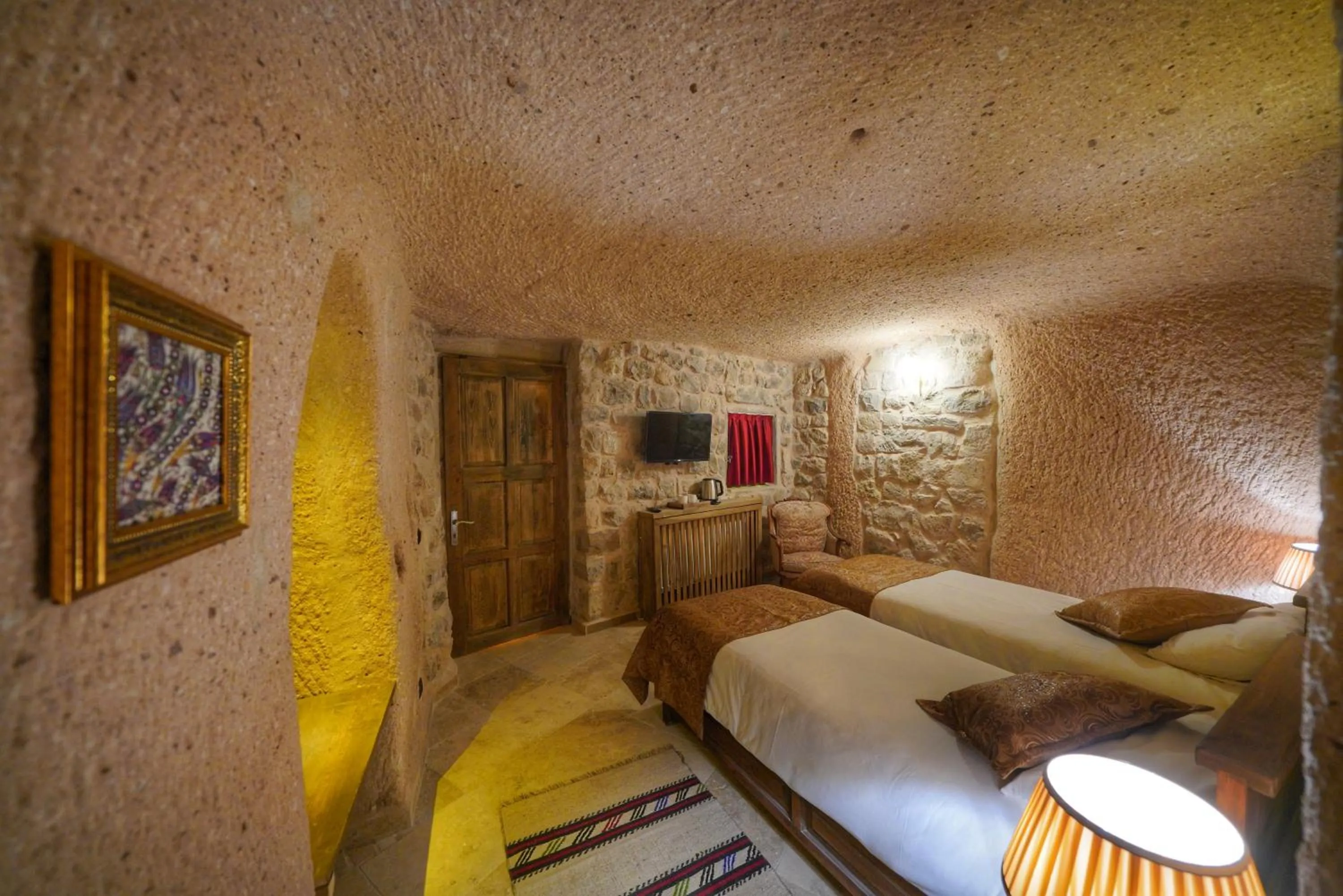 Bed in Takaev Cave House