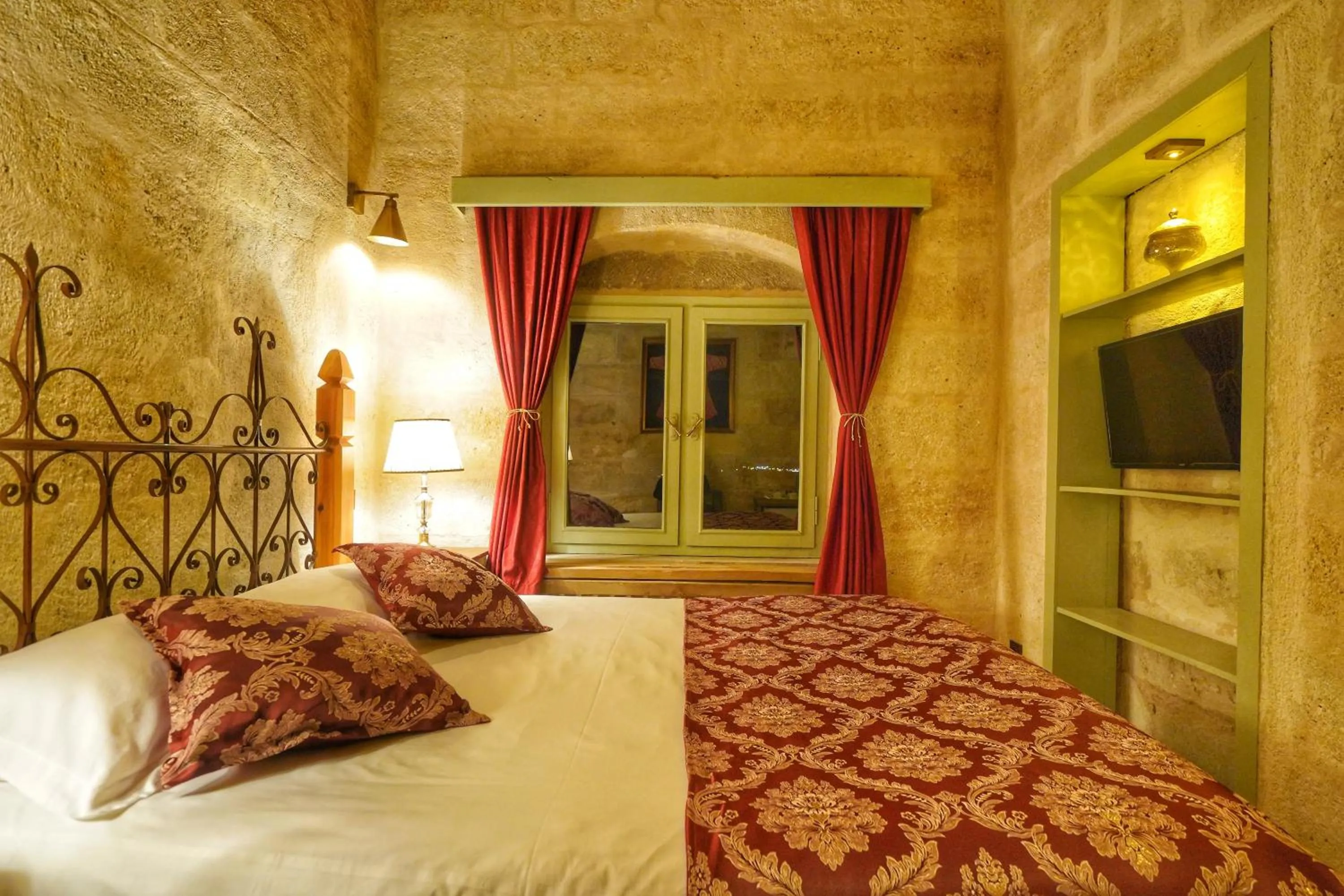 Bed in Takaev Cave House