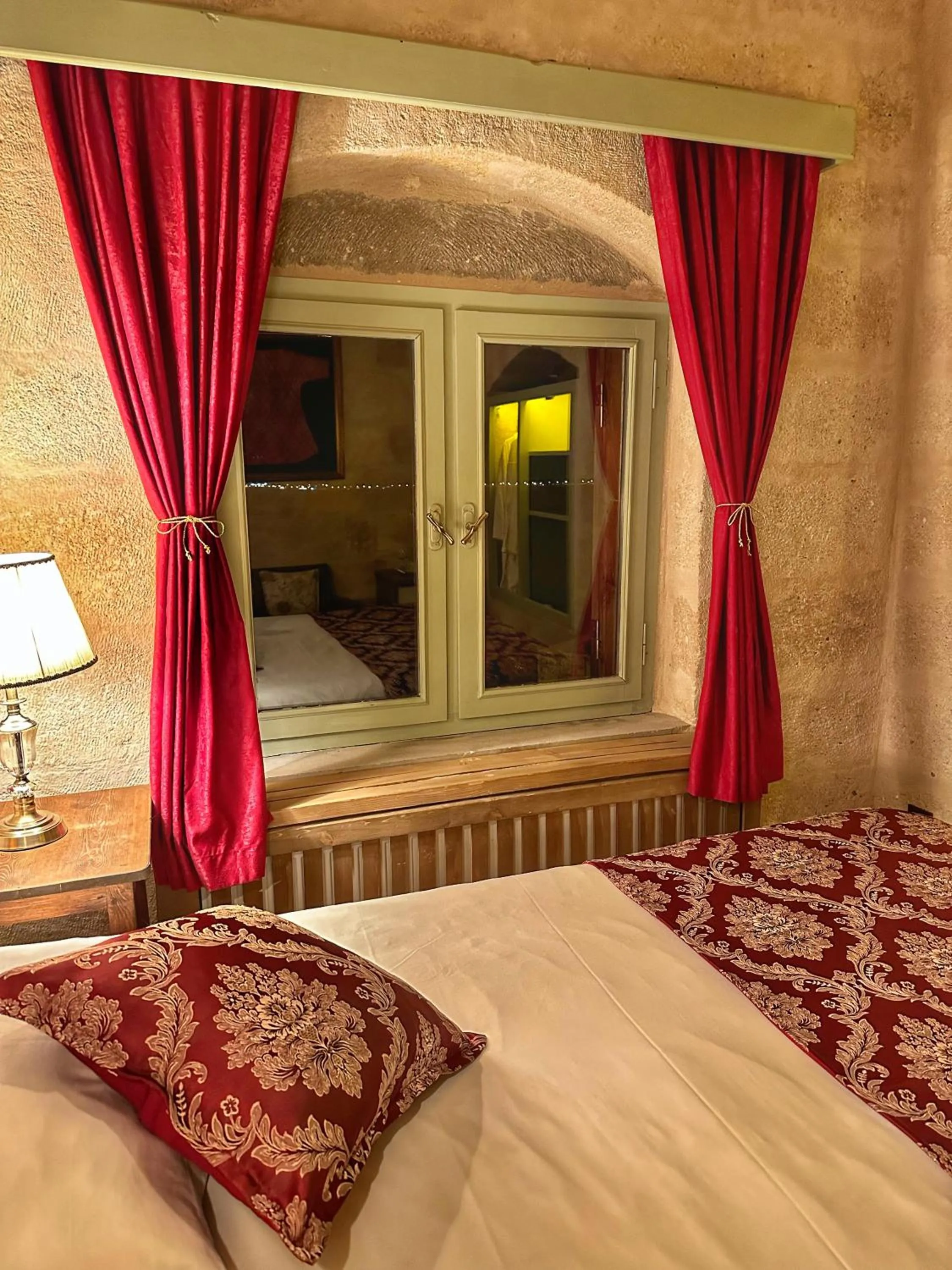 Bed in Takaev Cave House