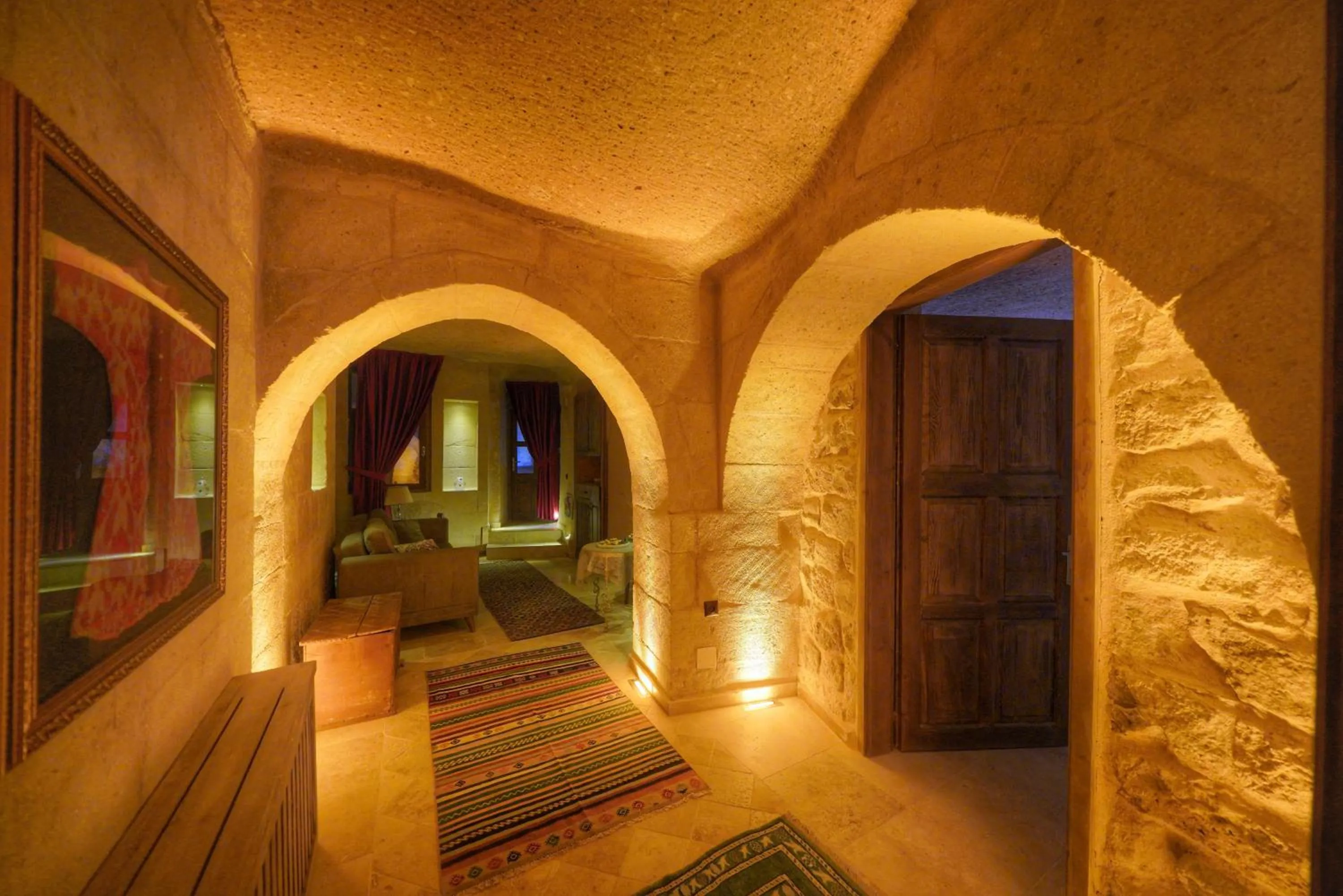 Living room, Bed in Takaev Cave House