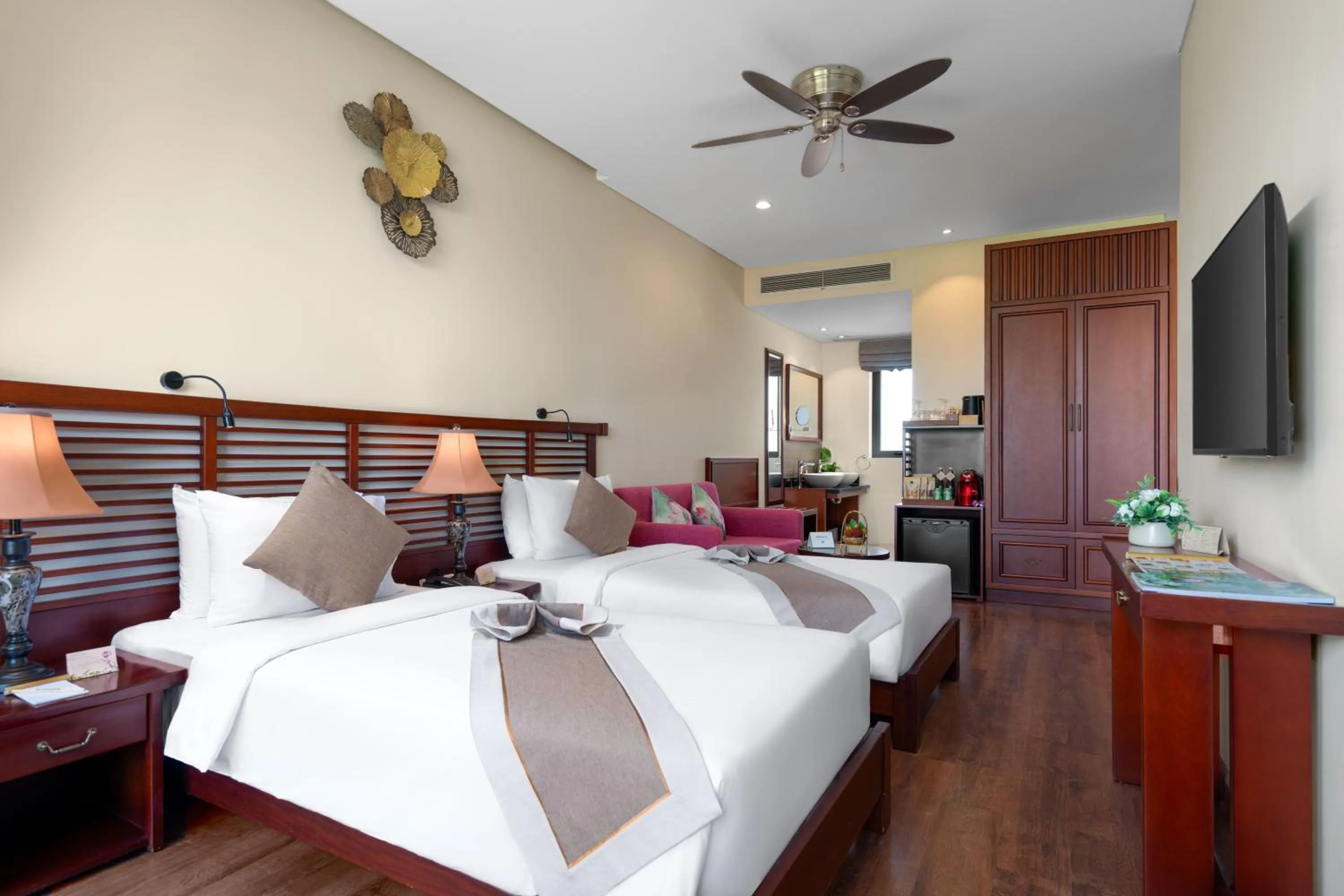 Bed in Silk Sense Hoi An River Resort - Green Luxury Escape
