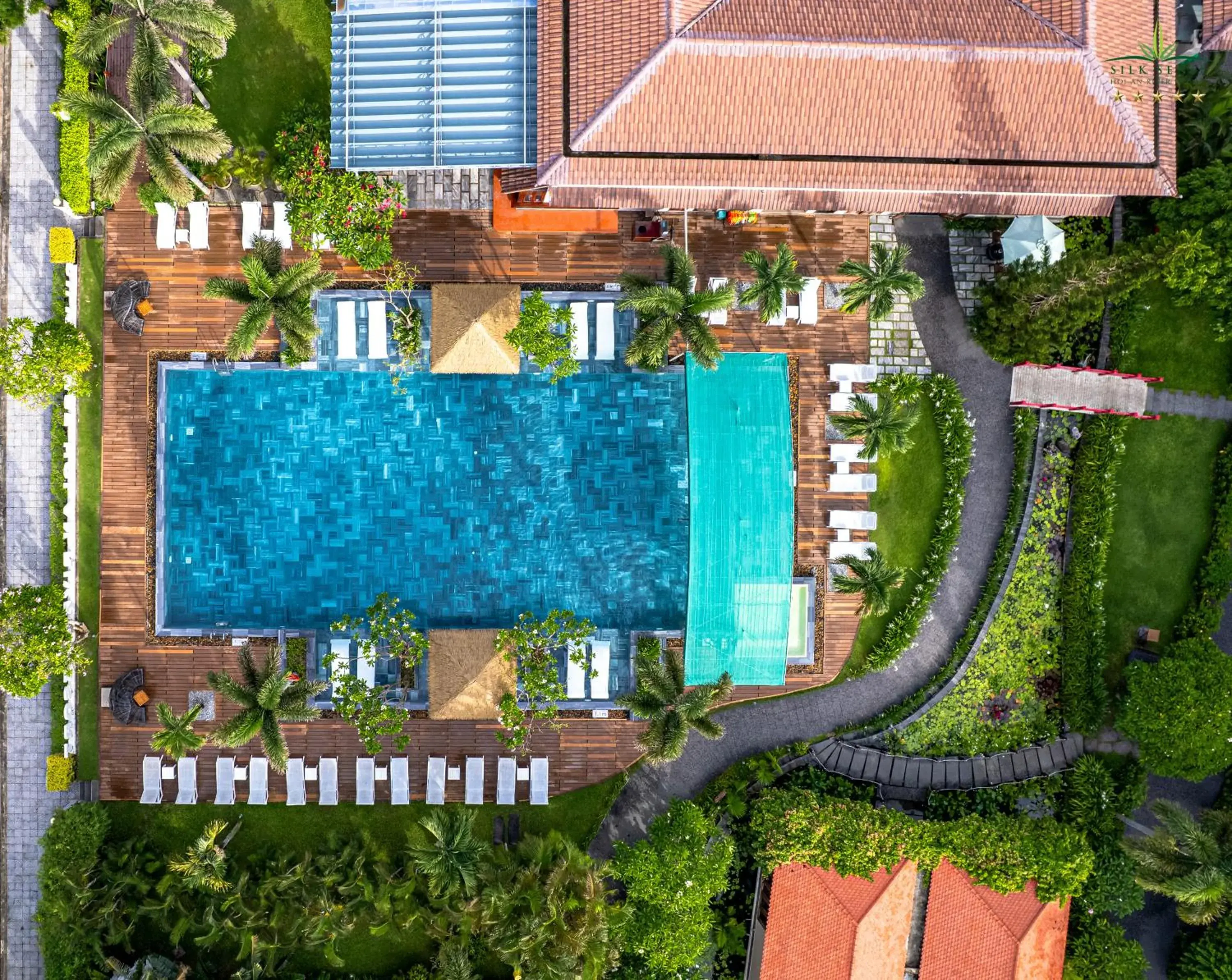 Pool view in Silk Sense Hoi An River Resort - Green Luxury Escape Pool view in Silk Sense Hoi An River Resort - Green Luxury Escape