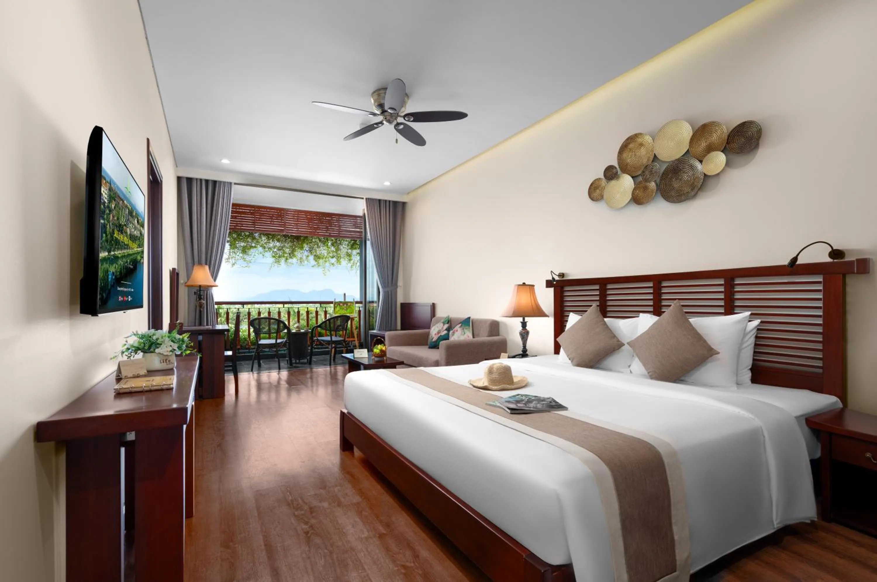 Bed in Silk Sense Hoi An River Resort - Green Luxury Escape