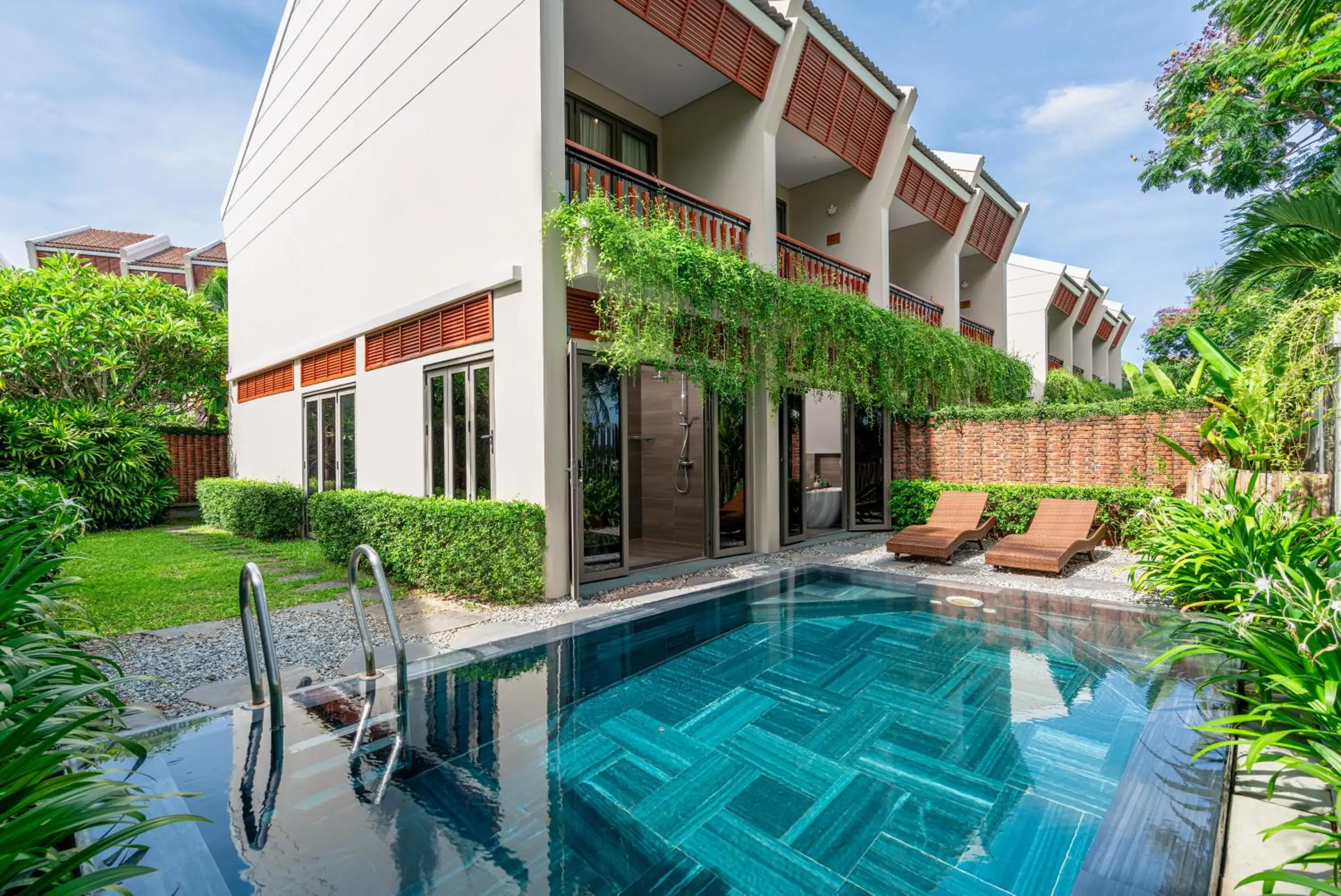 Swimming pool in Silk Sense Hoi An River Resort - A Sustainable Destination Swimming pool in Silk Sense Hoi An River Resort - A Sustainable Destination