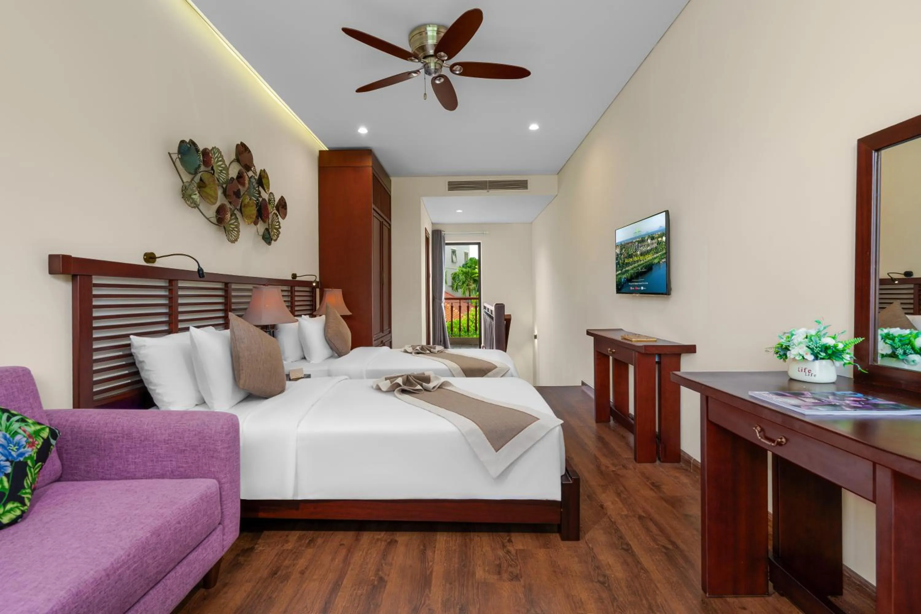 Bed in Silk Sense Hoi An River Resort - Green Luxury Escape