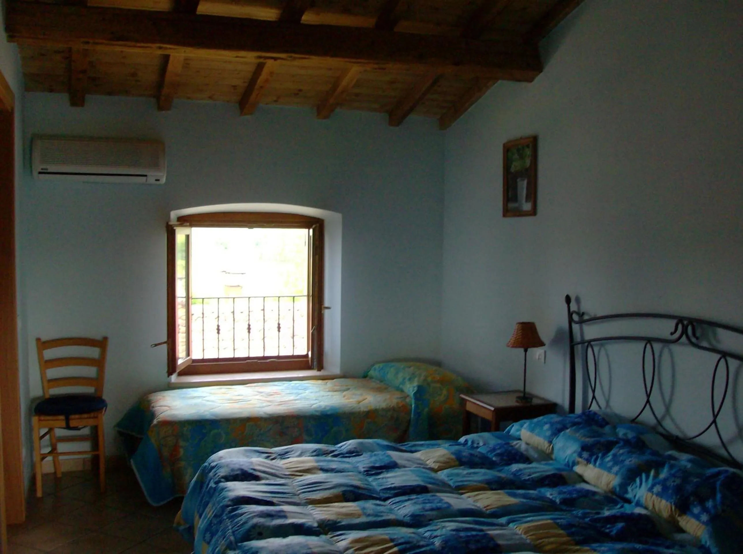 Photo of the whole room, Bed in Agriturismo La Palazzina