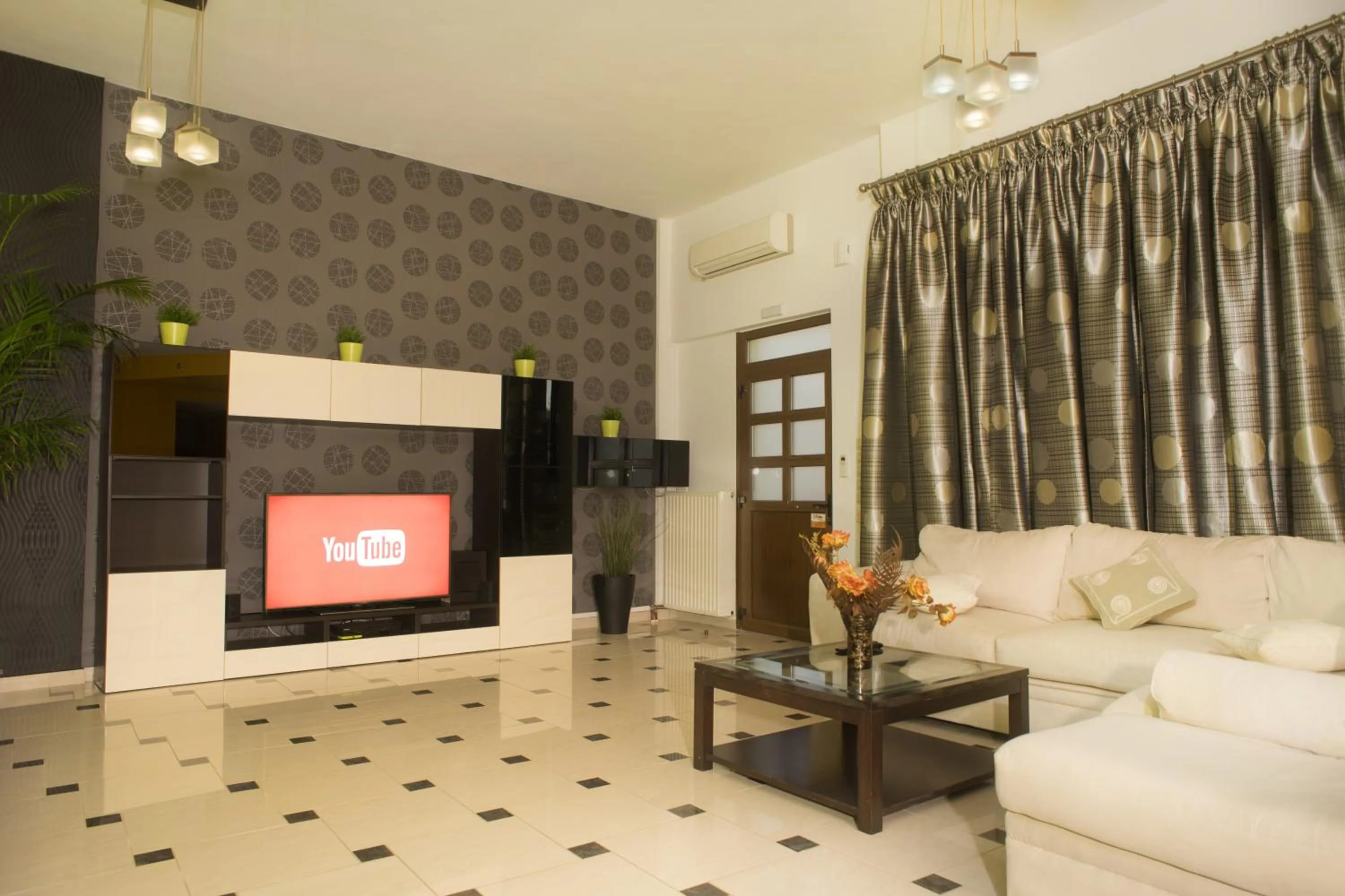 Living room in Mythos- Platanias- Hotel -Apts