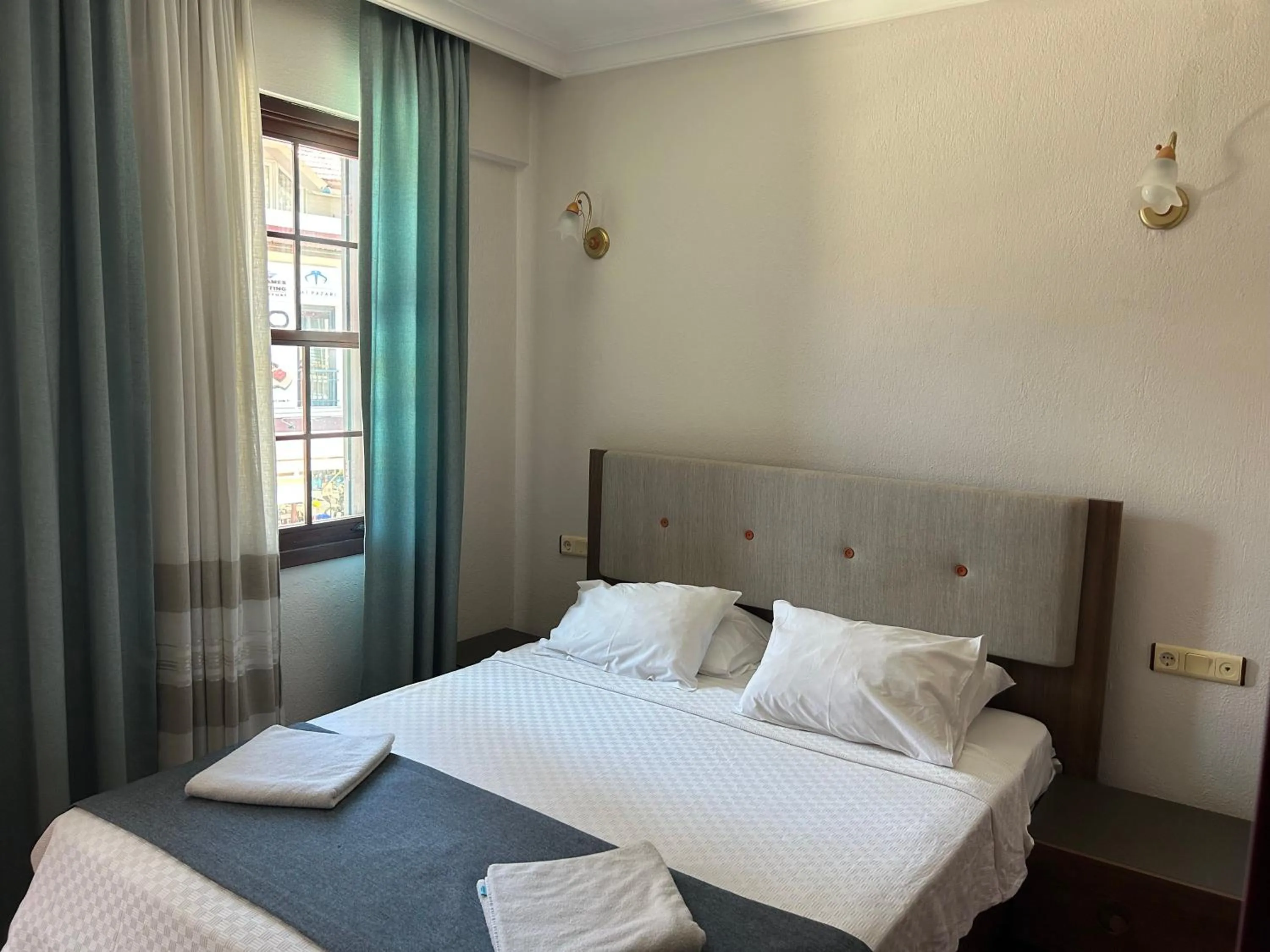 Bed in Villa Danlin Hotel