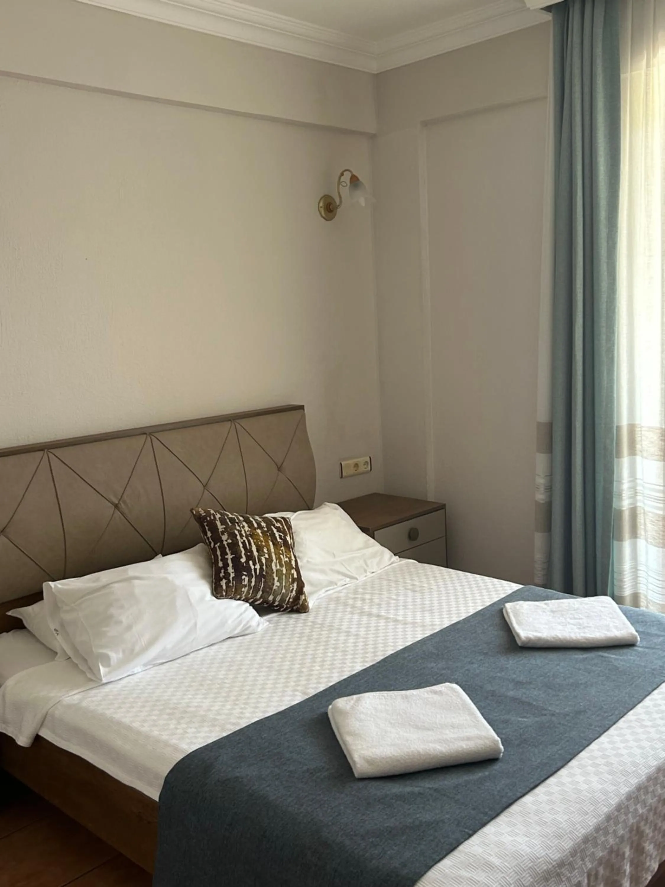 Bed in Villa Danlin Hotel