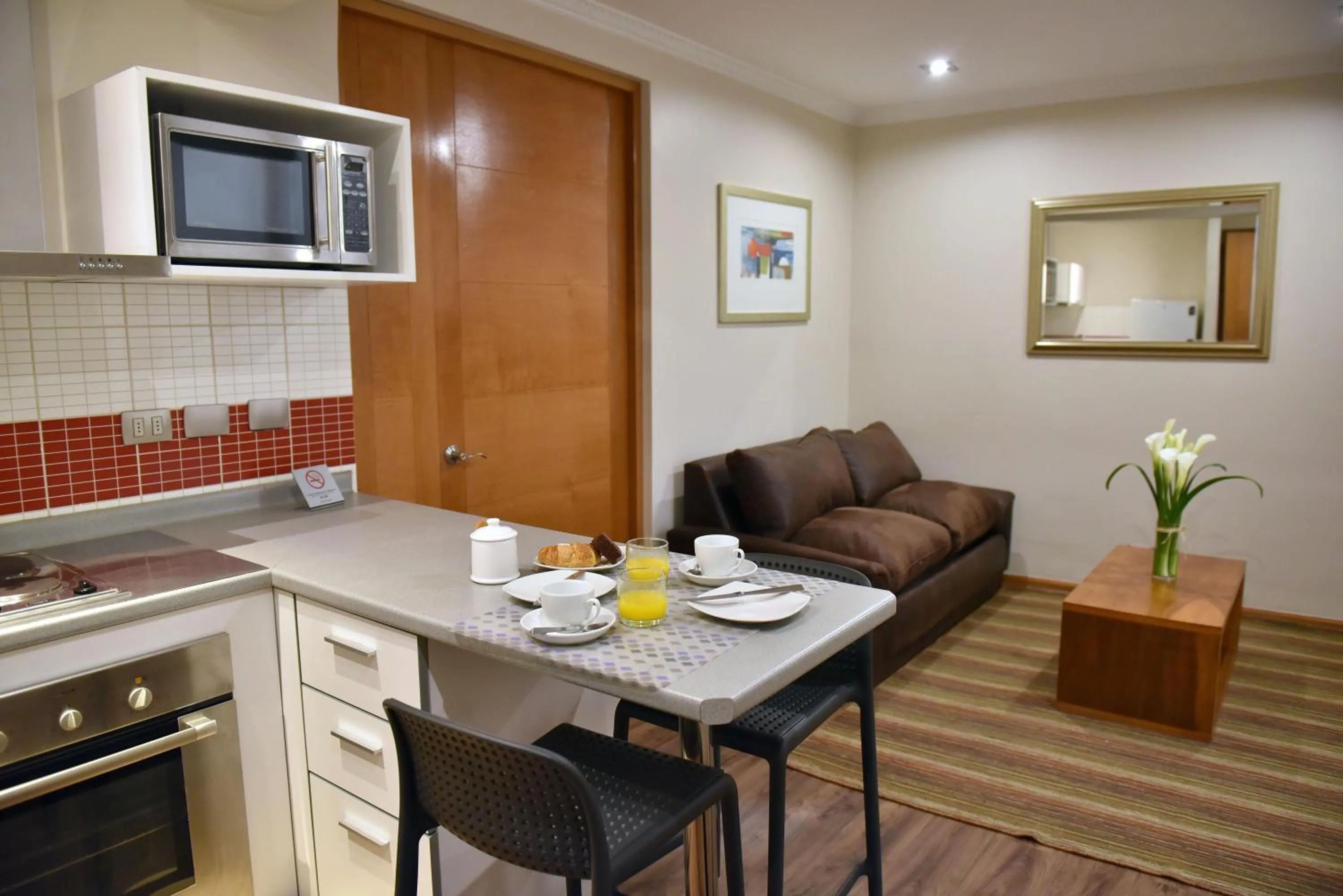 Kitchen or kitchenette in Lastarria Aparts