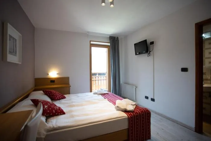 Bed in Ciasa Alpina Relax Hotel