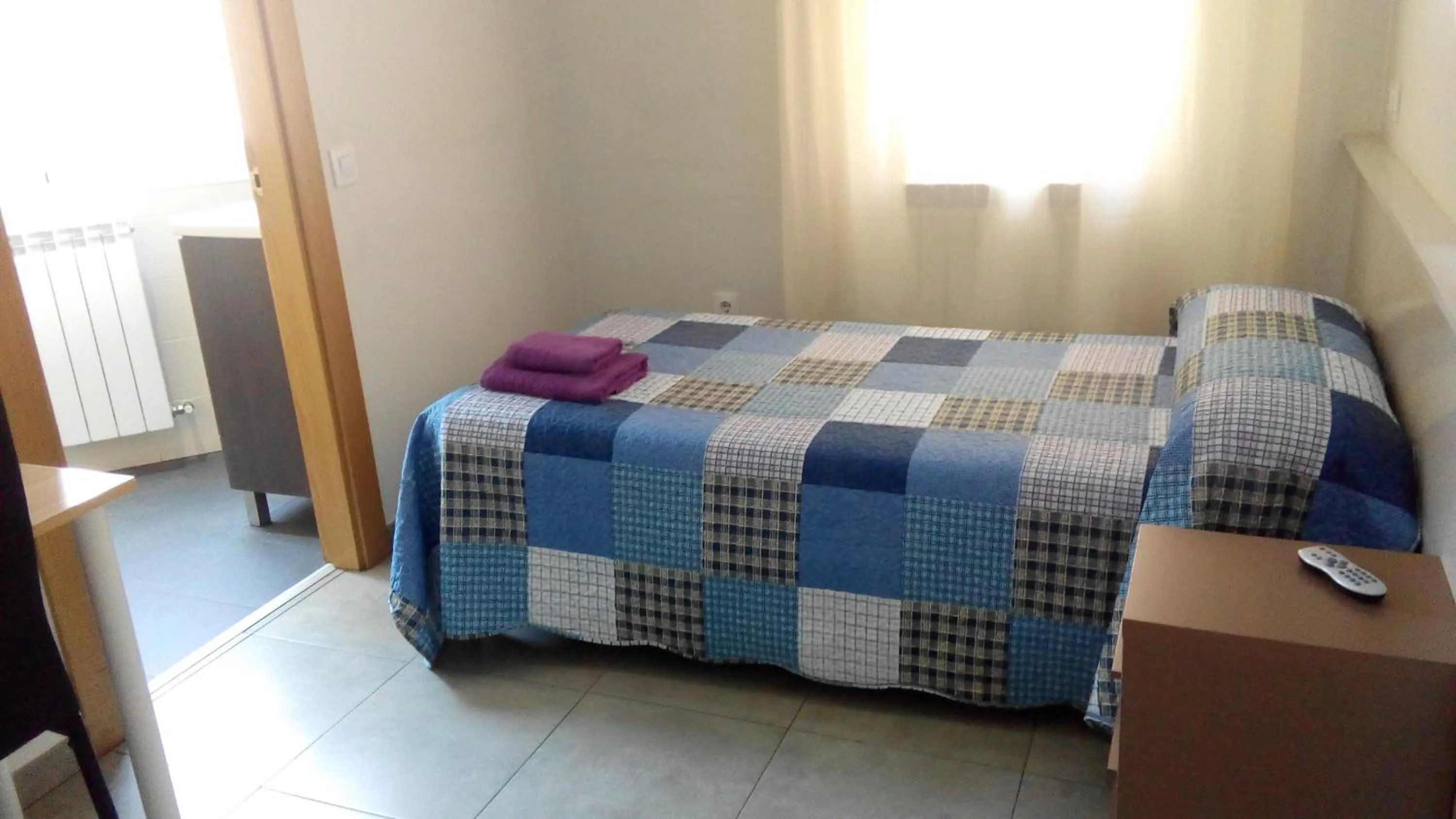 Decorative detail, Bed in Pensión Calfred II