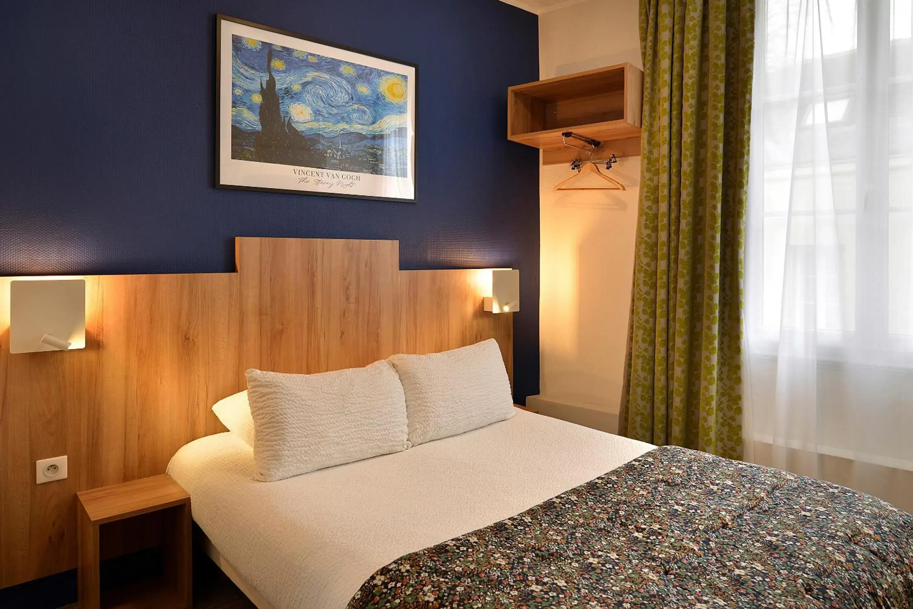 Bed in Logis Hôtel Maison Voltaire Bed in Logis Hôtel Maison Voltaire