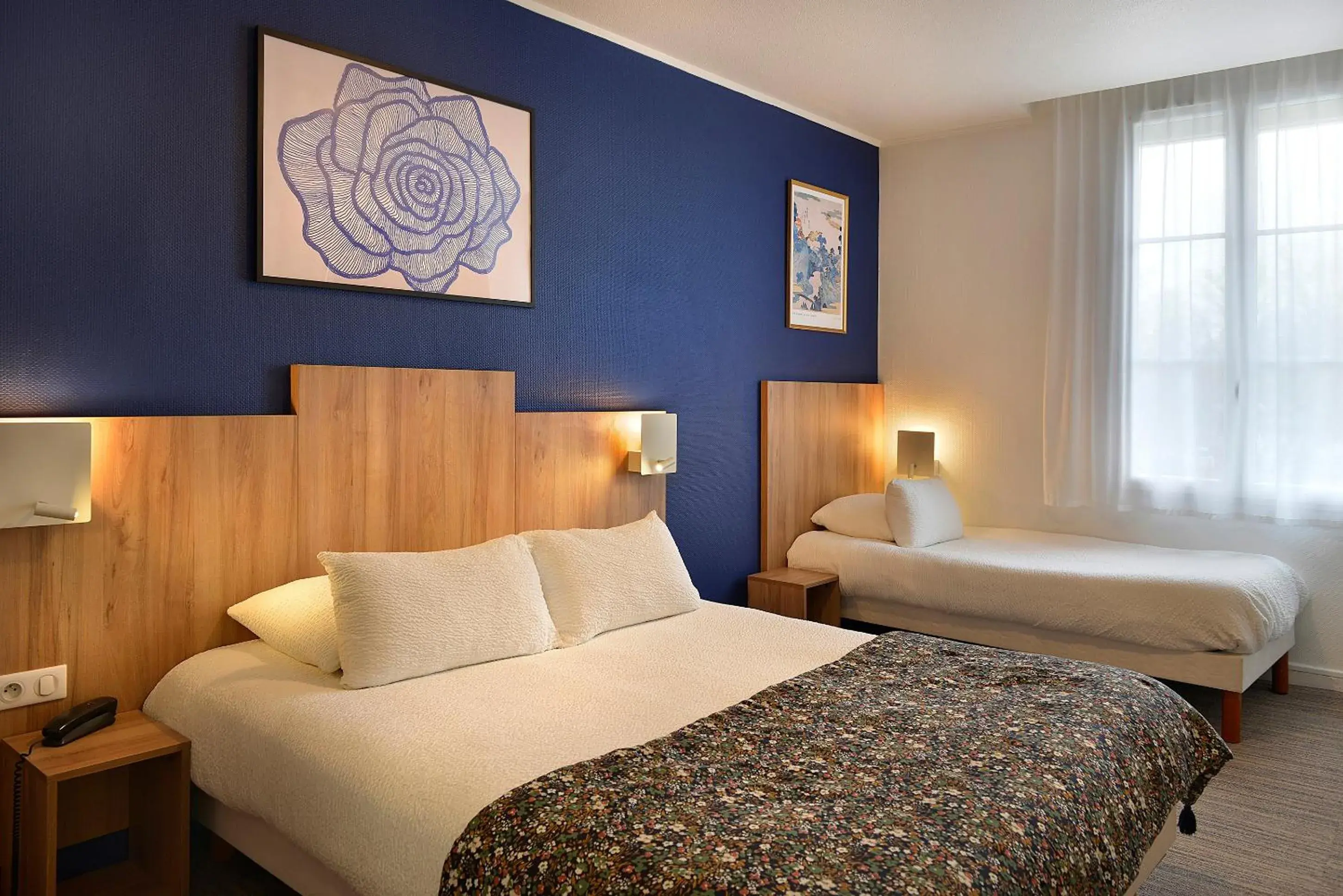 Bed in Logis Hôtel Maison Voltaire Bed in Logis Hôtel Maison Voltaire