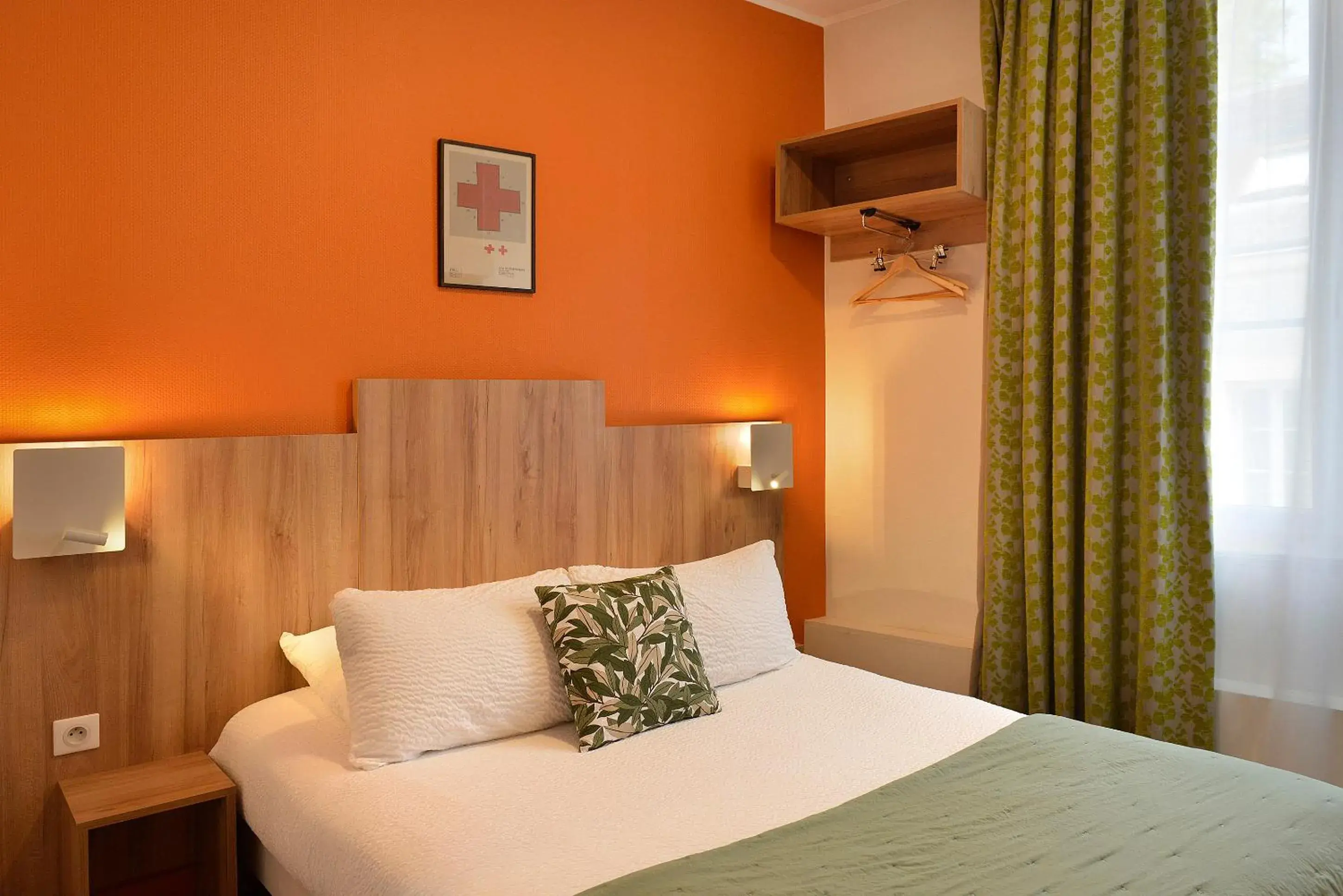 Bed in Logis Hôtel Maison Voltaire Bed in Logis Hôtel Maison Voltaire