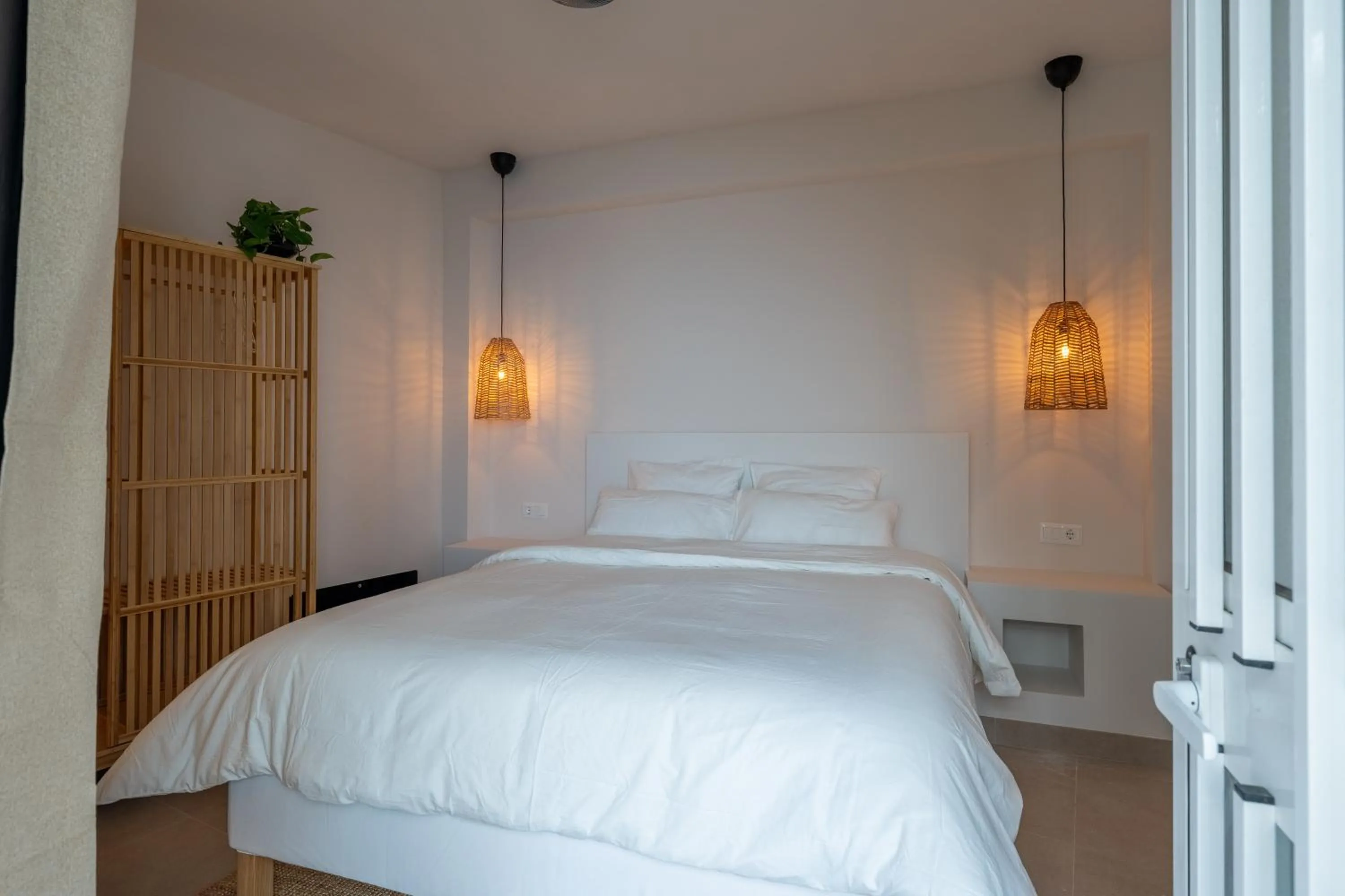 Bed in I AM La Posada Hotel and Apartment