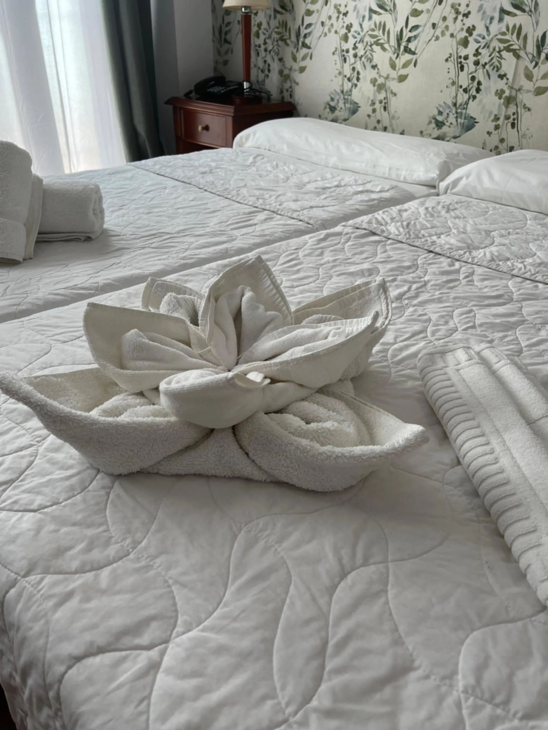 Bed in I AM La Posada Hotel and Apartment