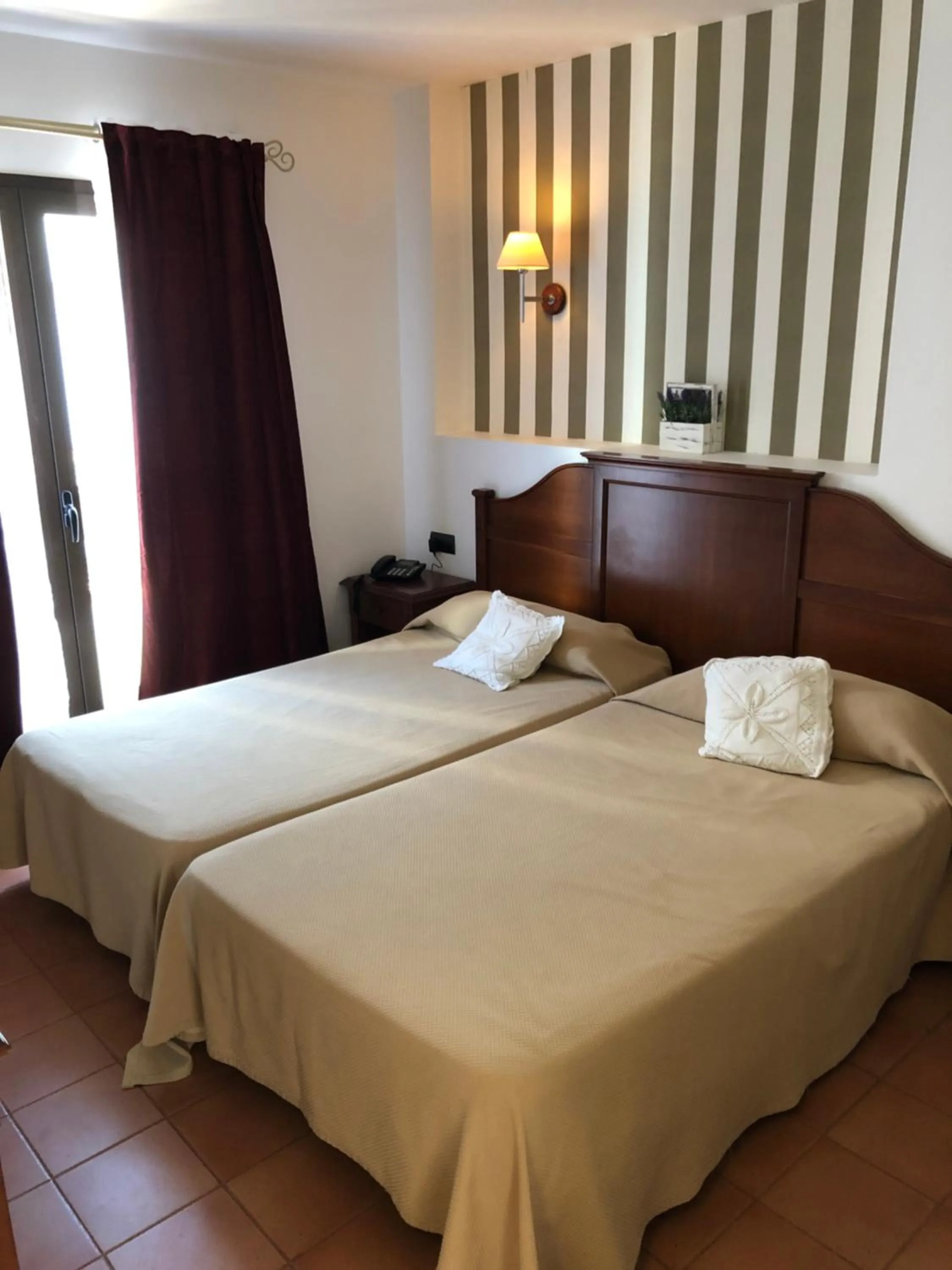 Bedroom, Bed in I AM La Posada Hotel and Apartment