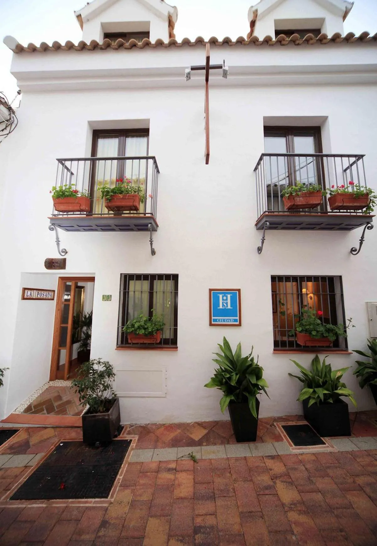 Property building in I AM La Posada Hotel and Apartment