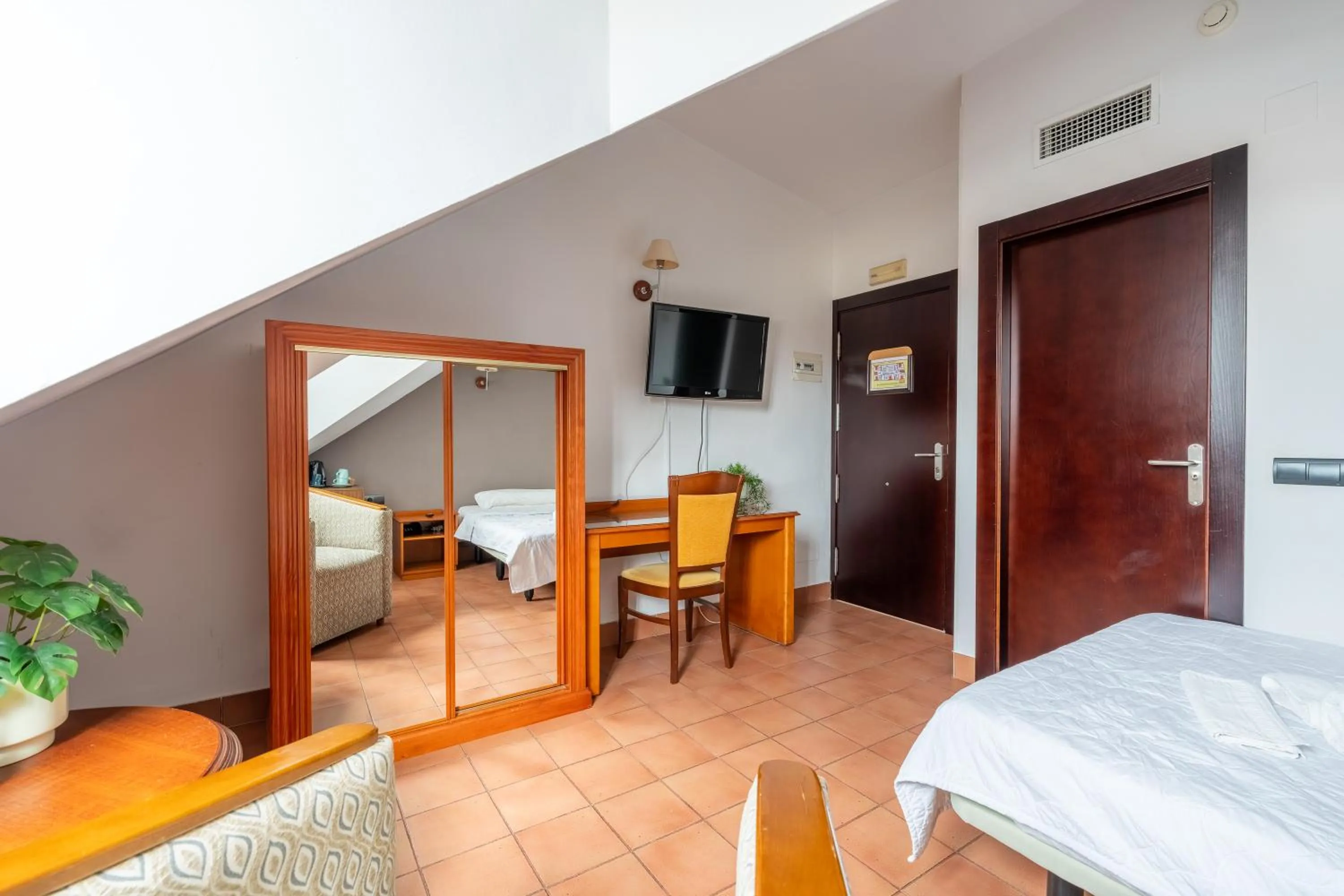 Photo of the whole room, Bed in I AM La Posada Hotel and Apartment