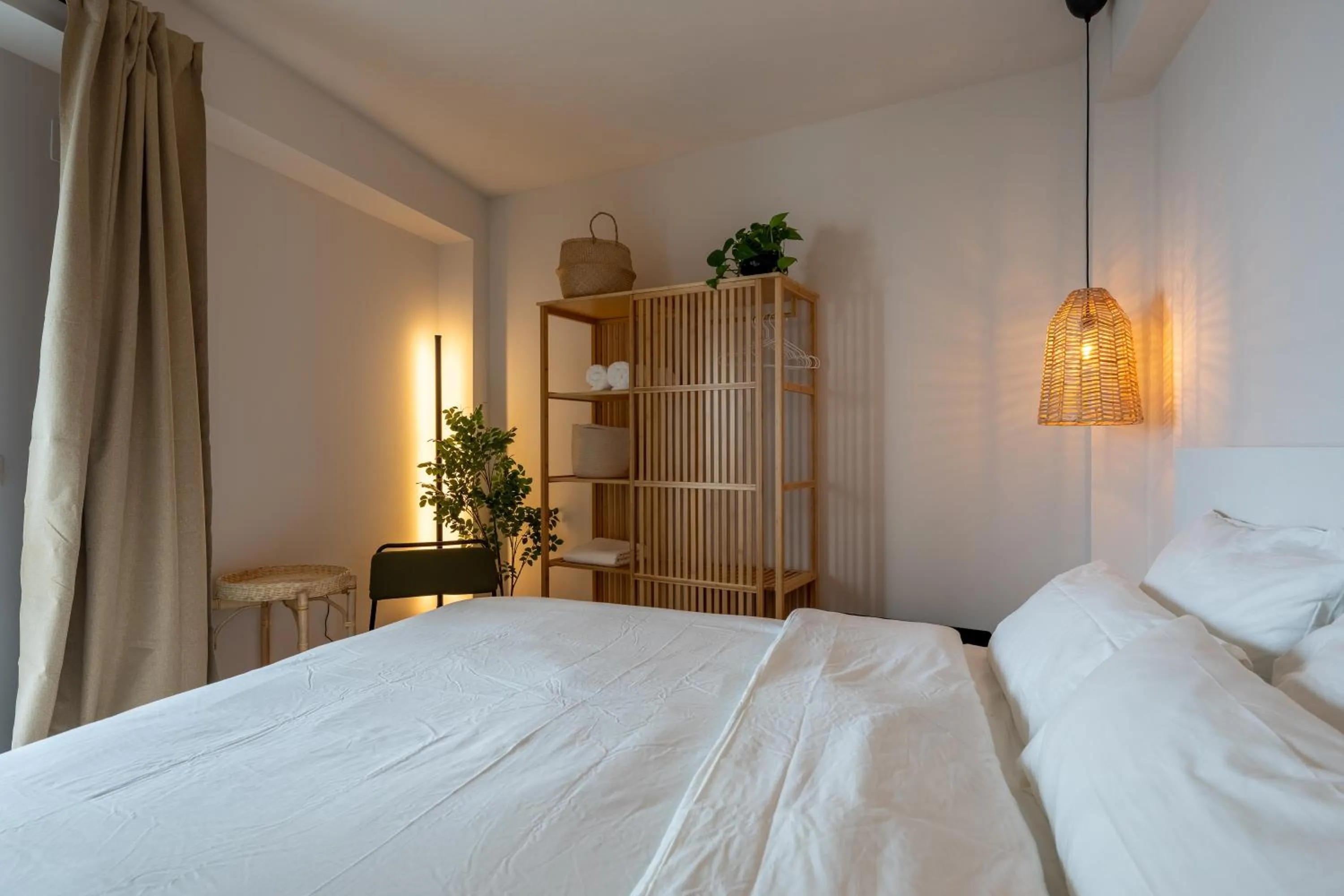 Bed in I AM La Posada Hotel and Apartment