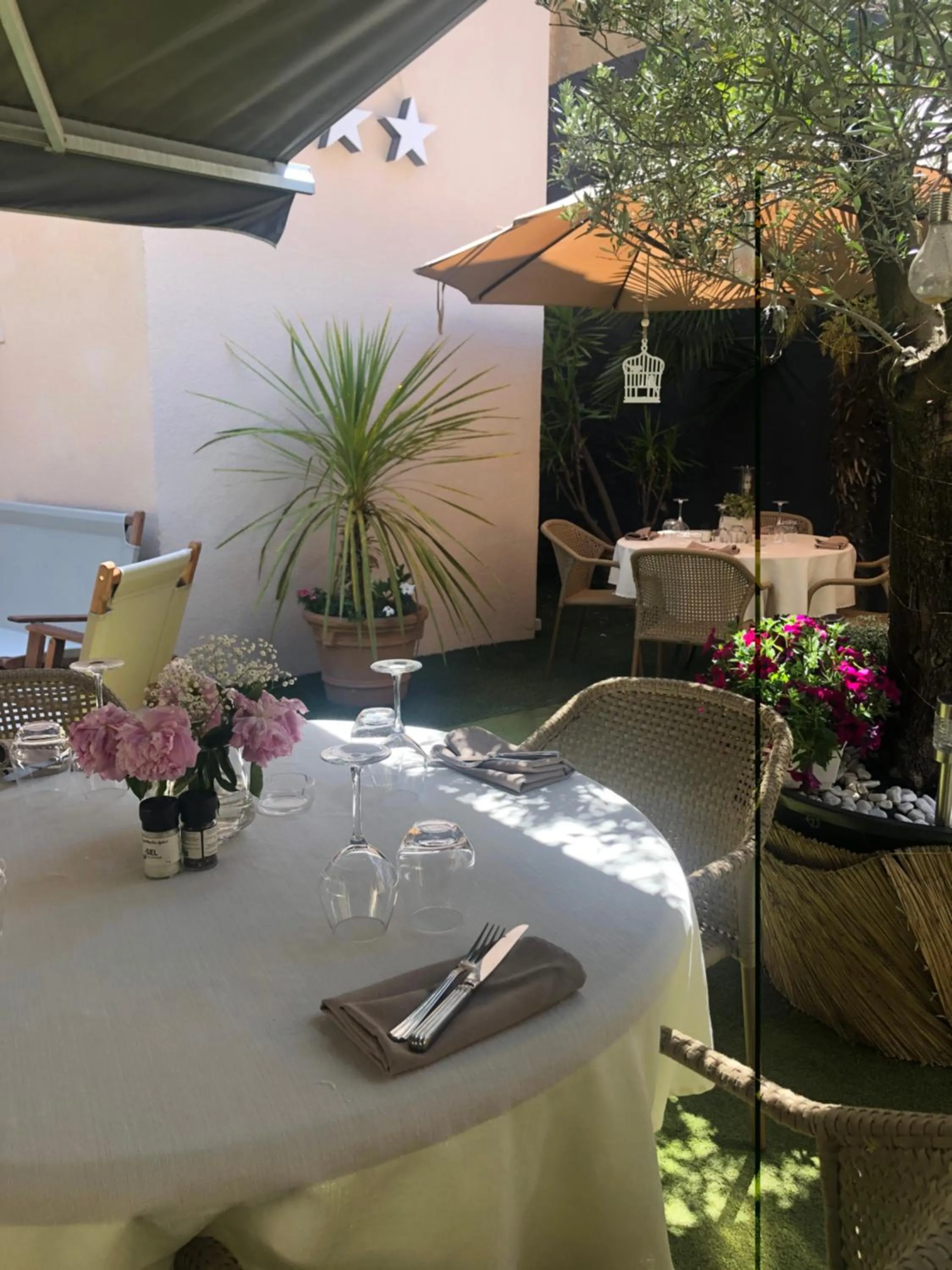 Patio in Logis Hôtel La Fenière