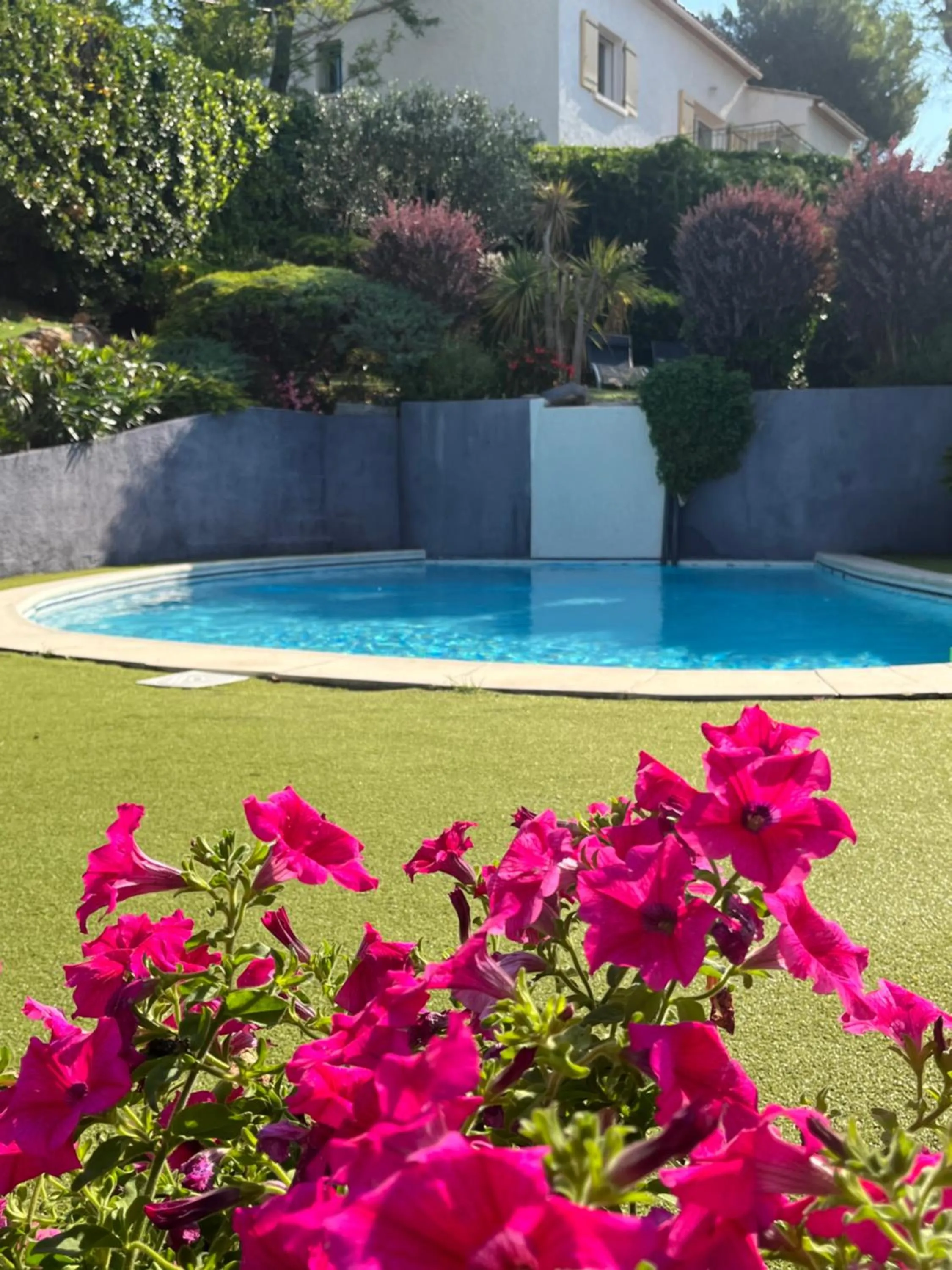 Garden in Logis Hôtel La Fenière