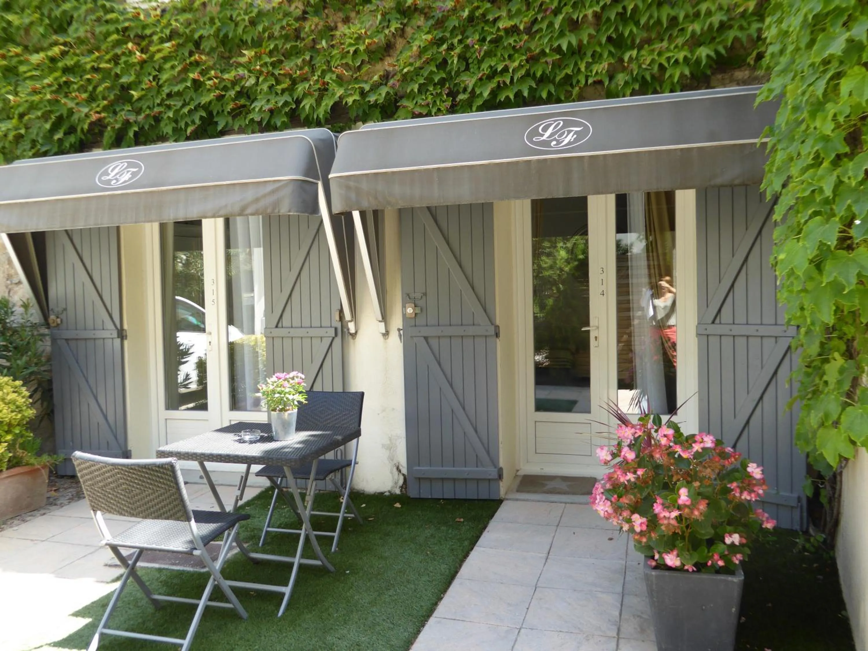 Patio in Logis Hôtel La Fenière