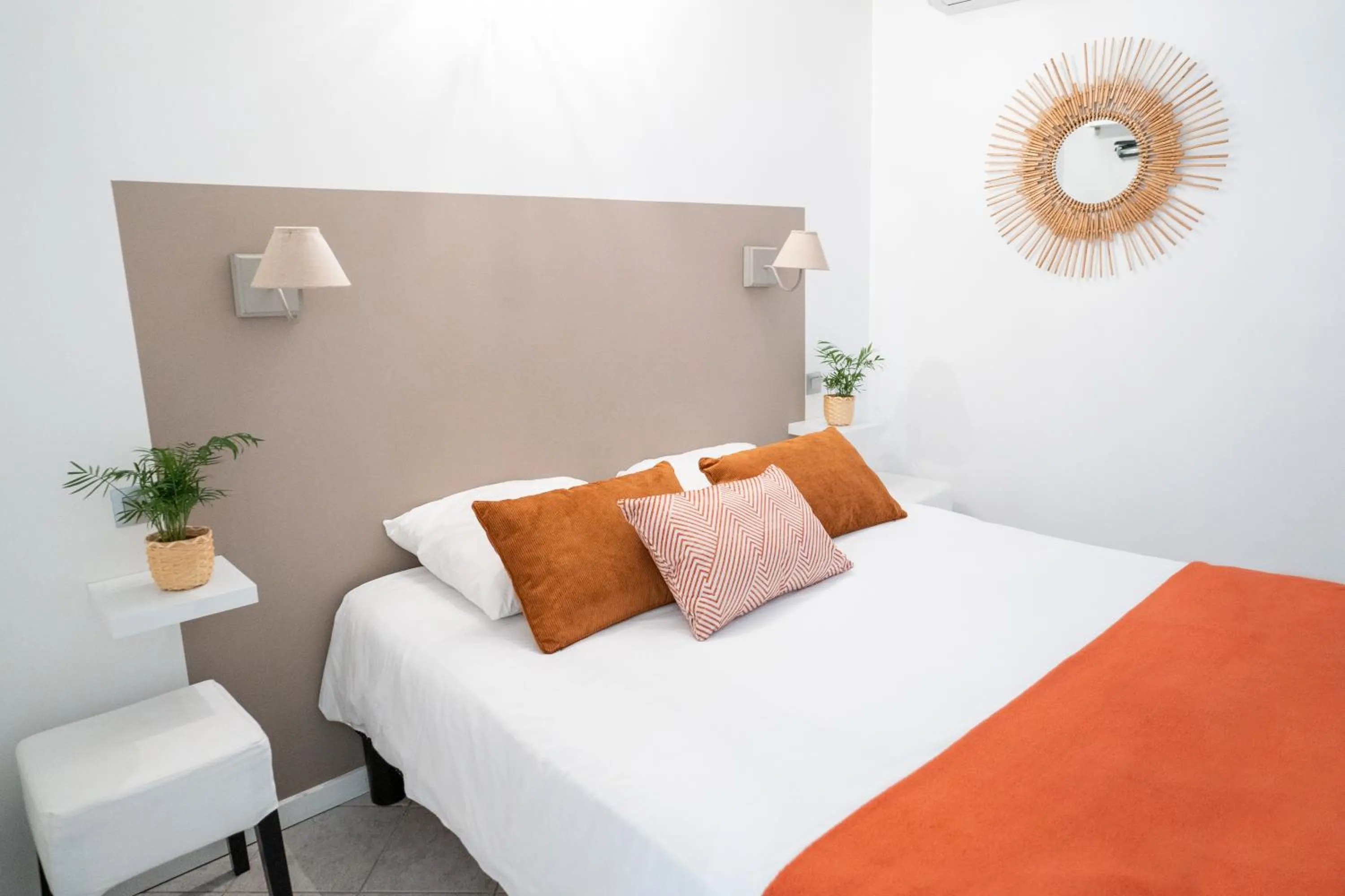 Bed in Logis Hôtel La Fenière