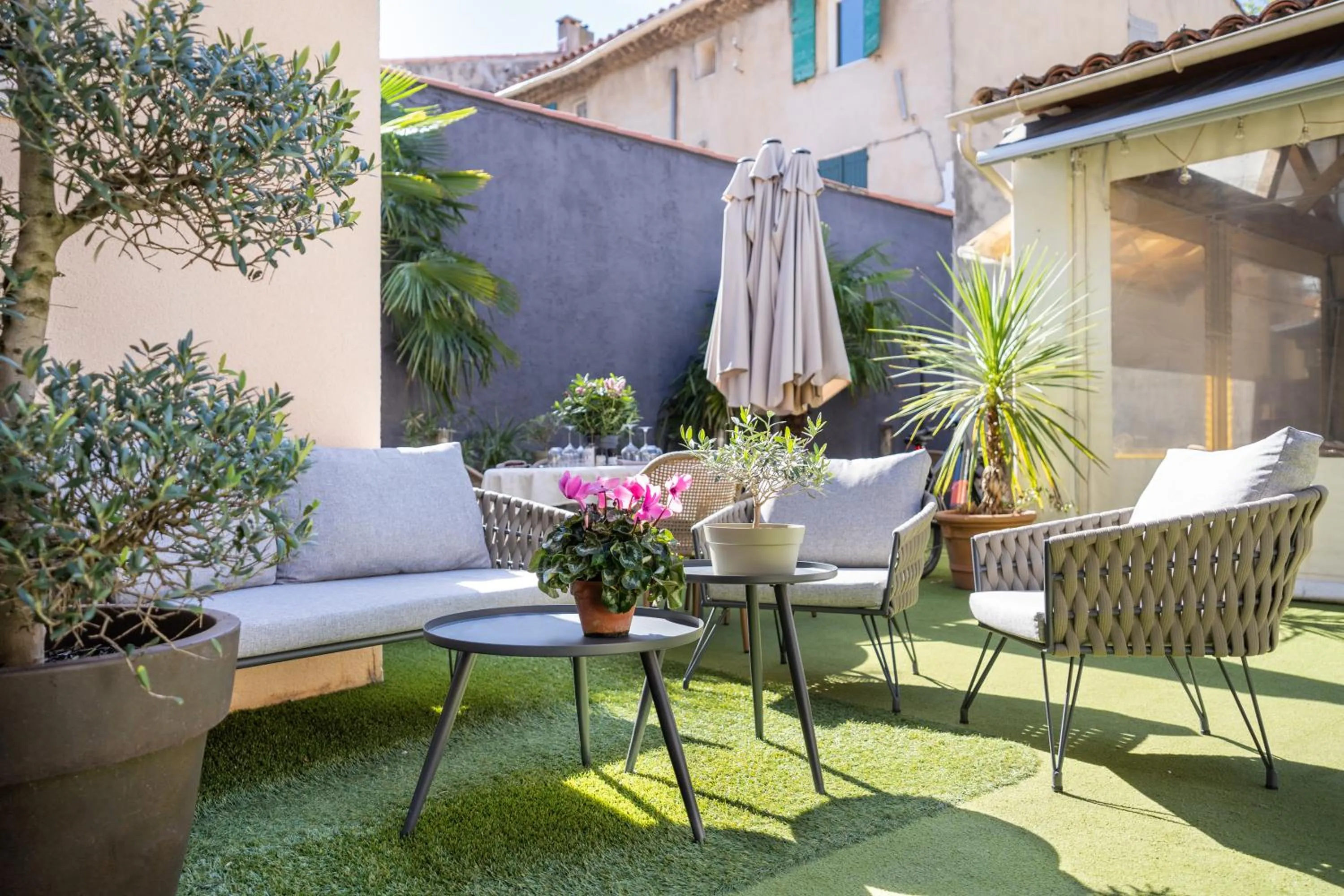 Patio in Logis Hôtel La Fenière