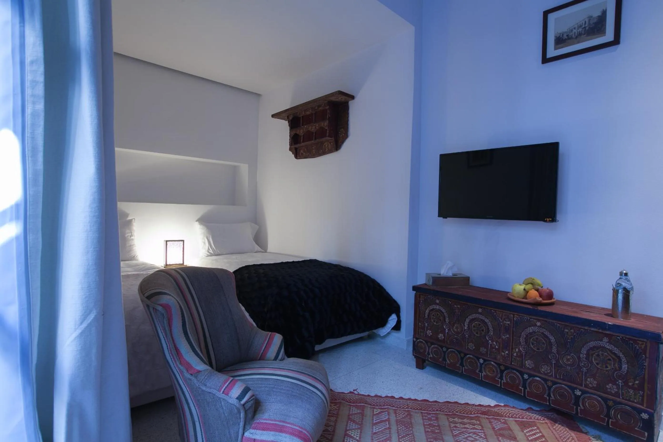 Photo of the whole room, Bed in Riad Zebrakaro