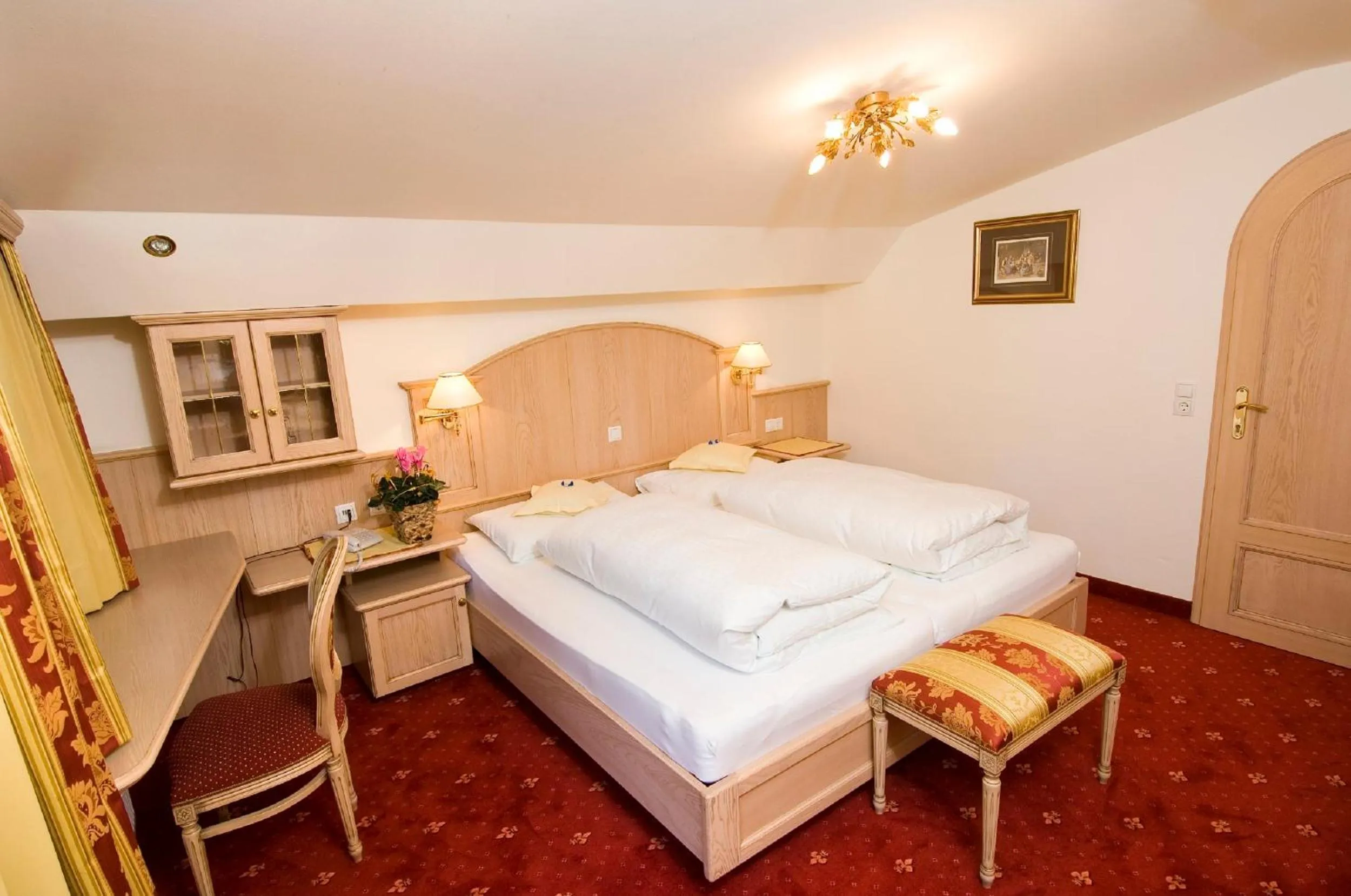 Bed in Alpenhotel Fernau