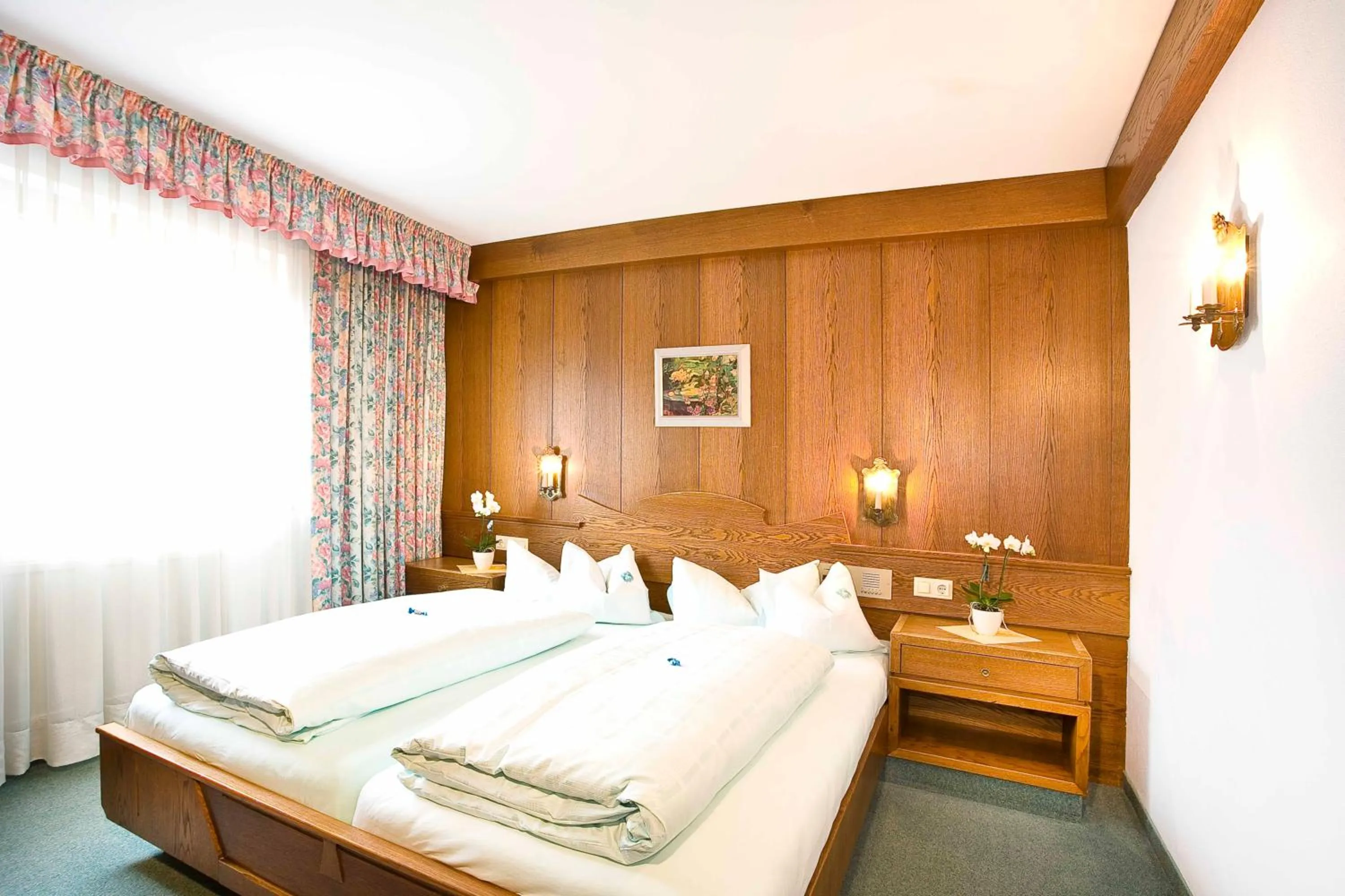 Bed in Alpenhotel Fernau