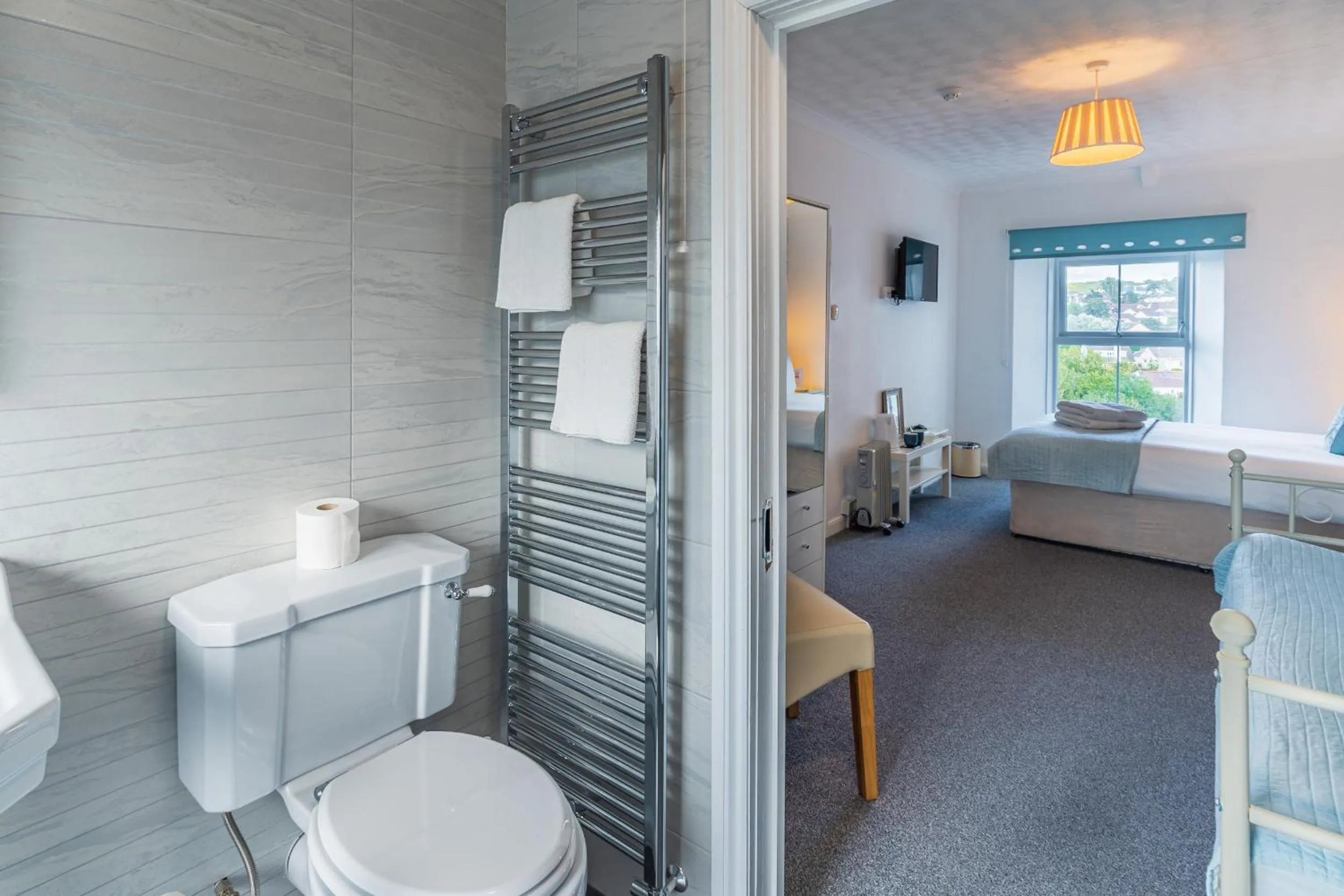 Toilet, Bed in Rooms at The Highcliffe