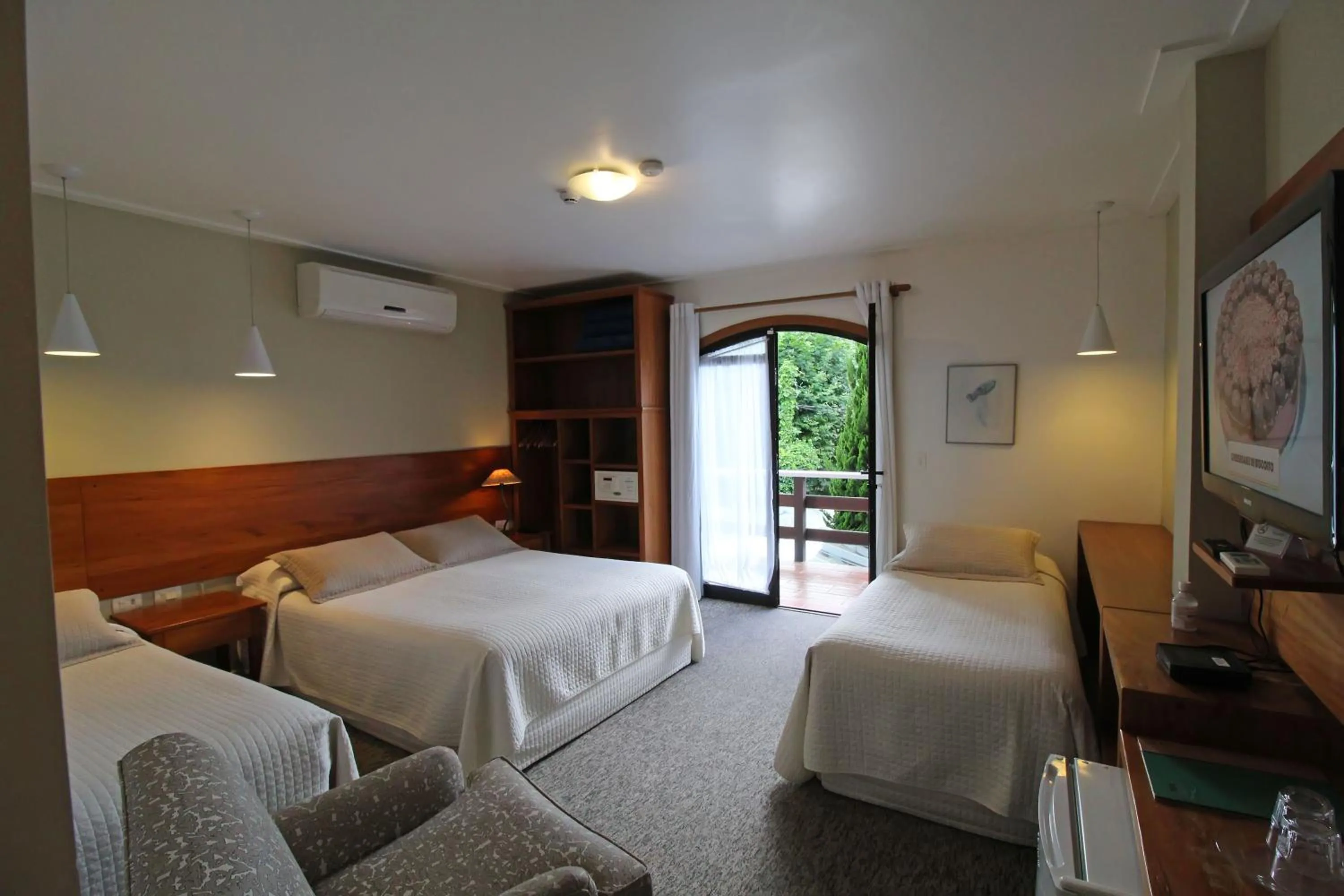 Bed in Pousada Villa Capivary Campos do Jordão