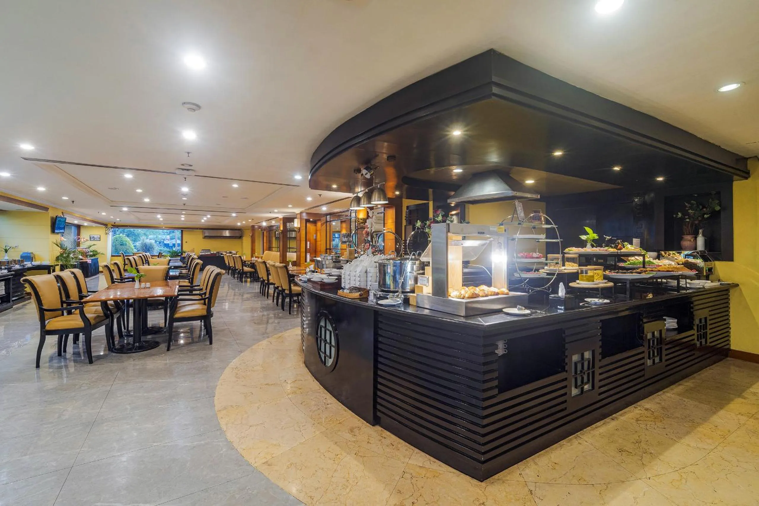 Buffet breakfast in Surabaya Suites Hotel Powered by Archipelago