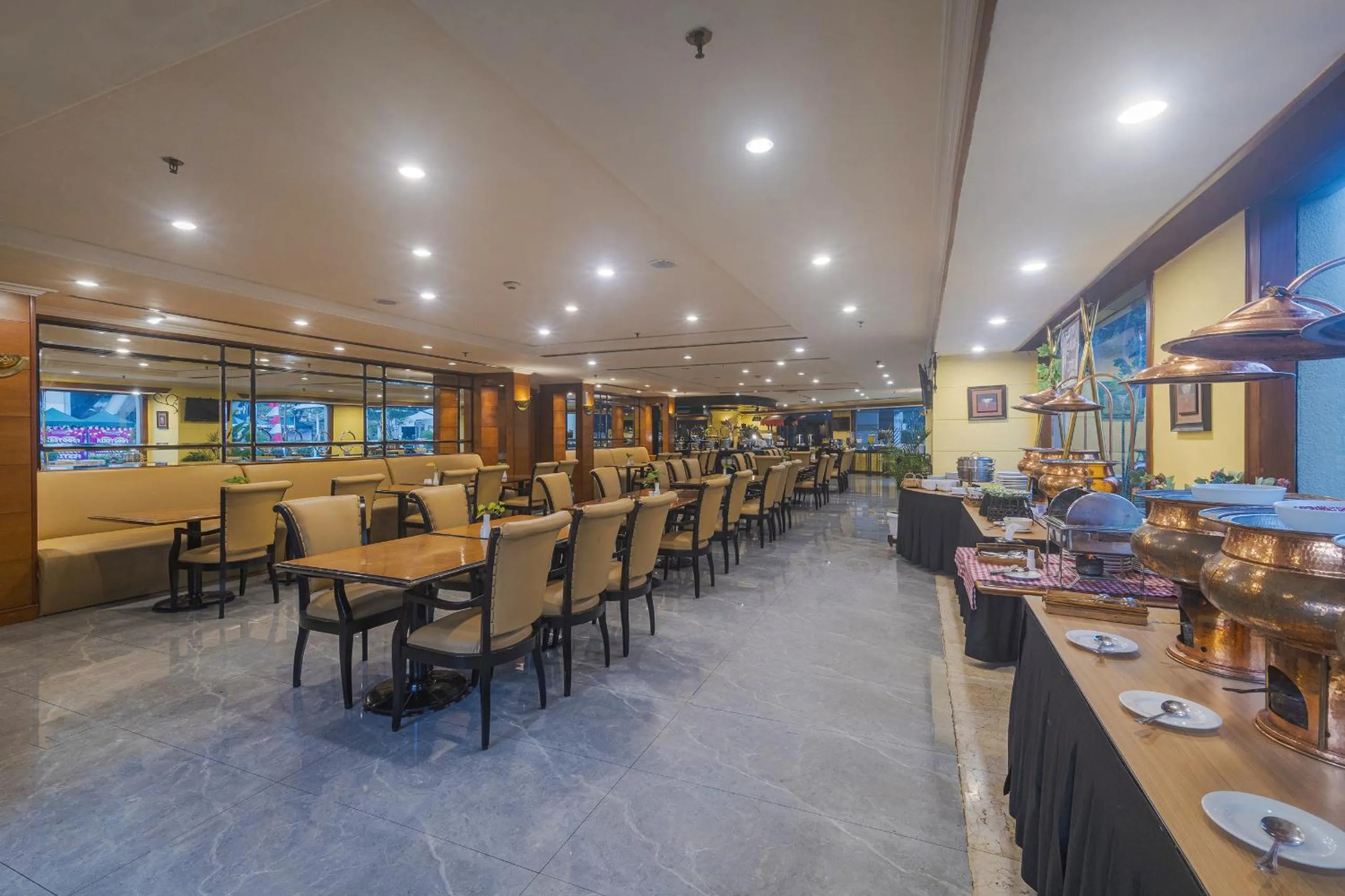 Buffet breakfast in Surabaya Suites Hotel Powered by Archipelago