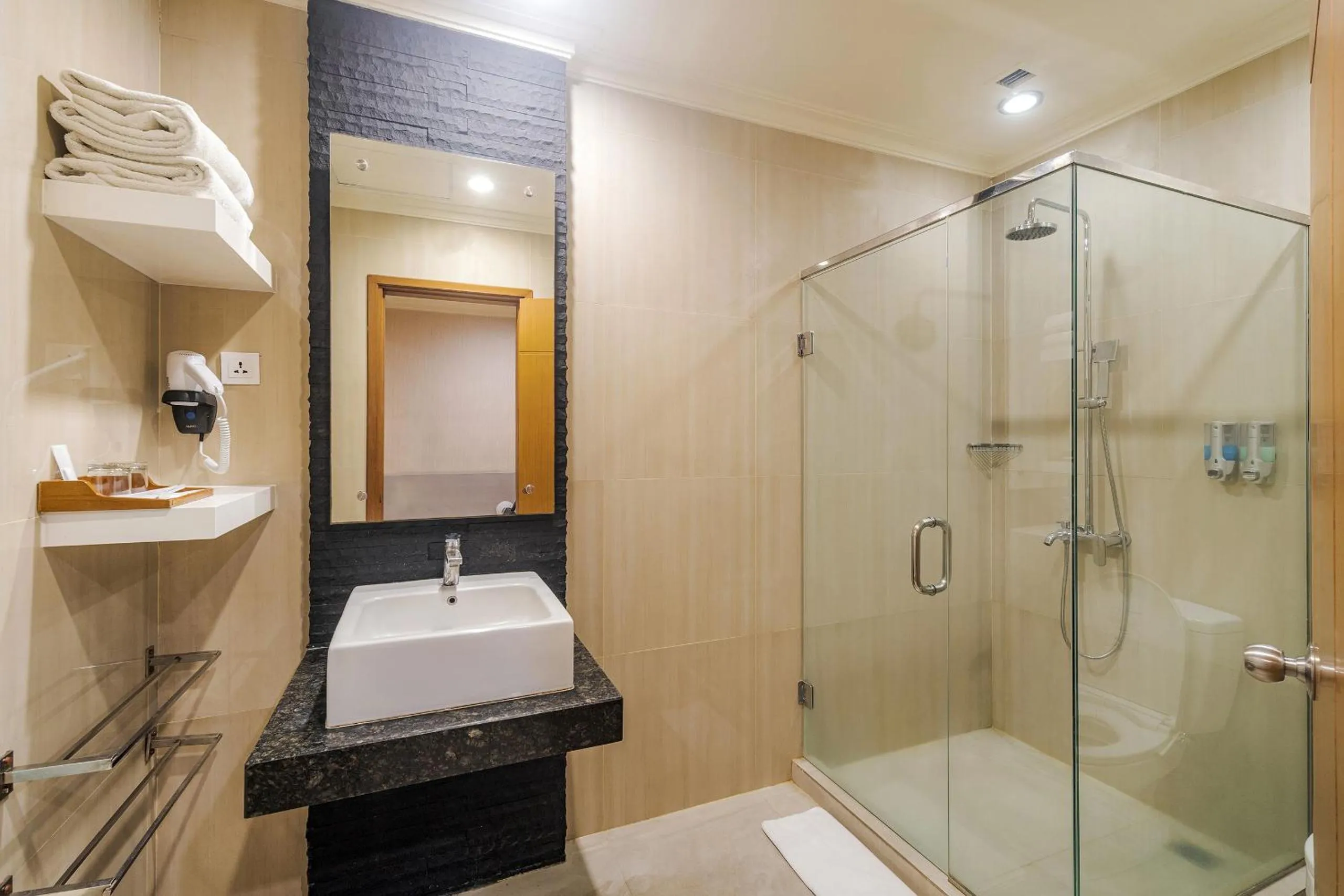 Bathroom in Surabaya Suites Hotel Powered by Archipelago