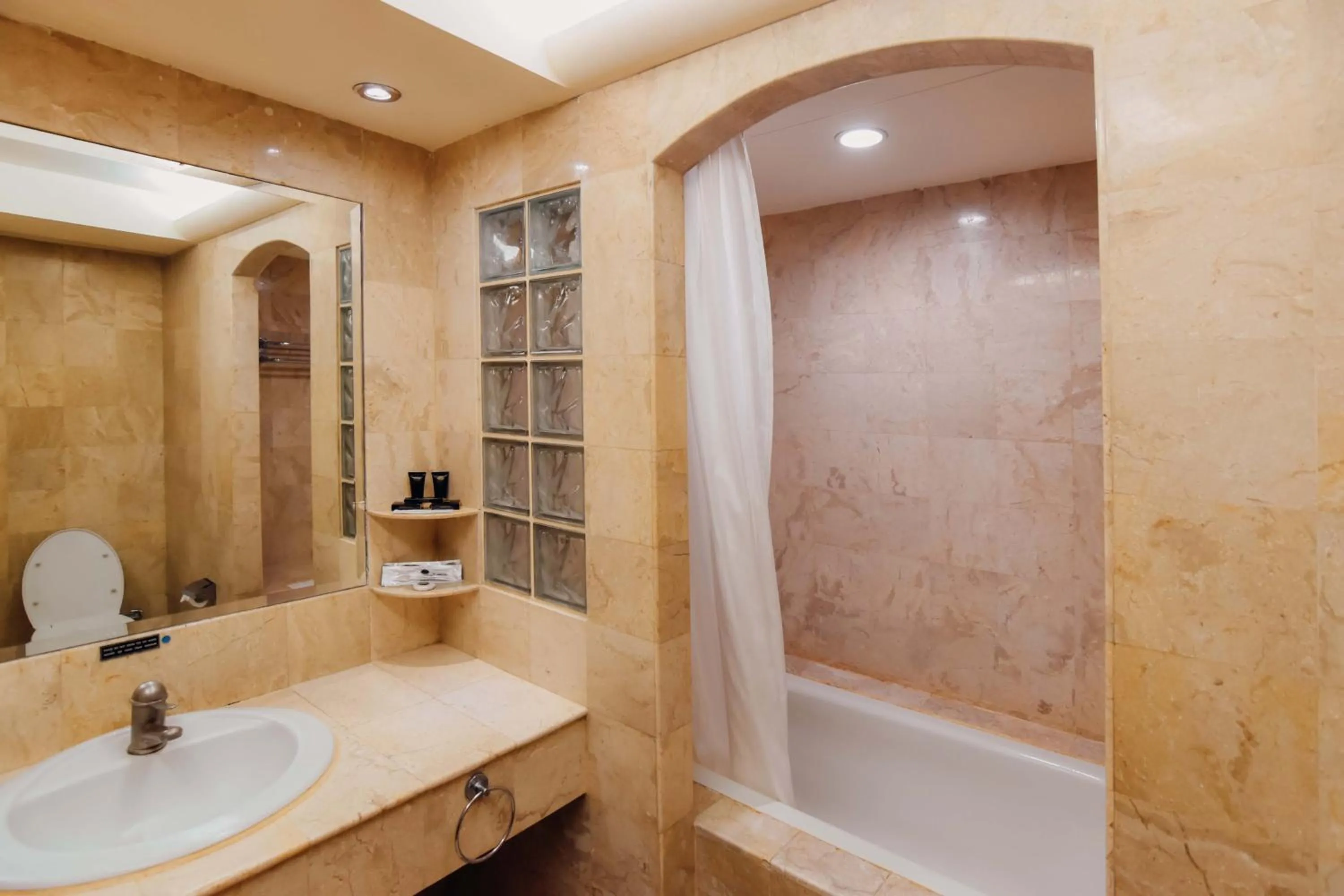 Bathroom in Surabaya Suites Hotel Powered by Archipelago