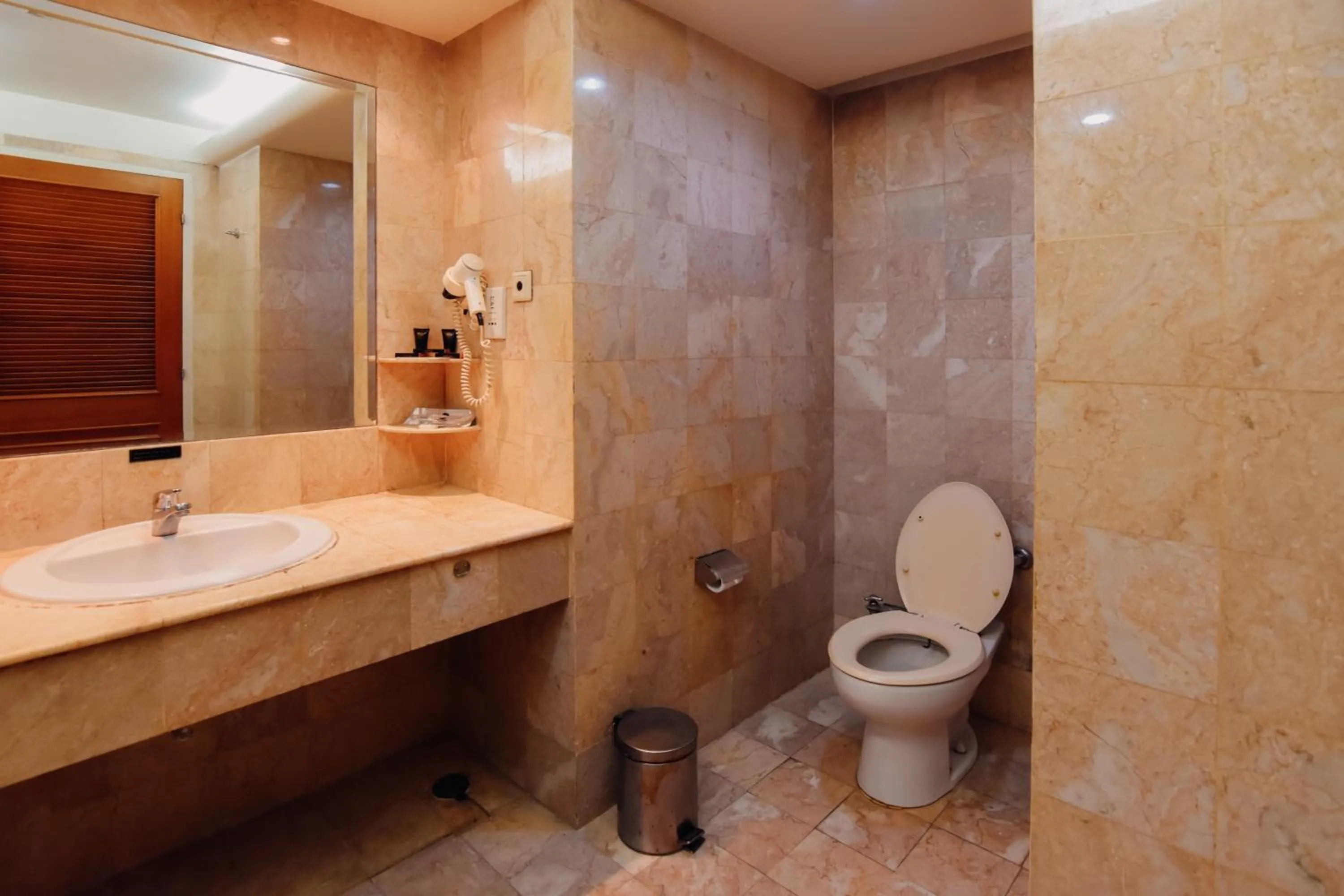 Bathroom in Surabaya Suites Hotel Powered by Archipelago