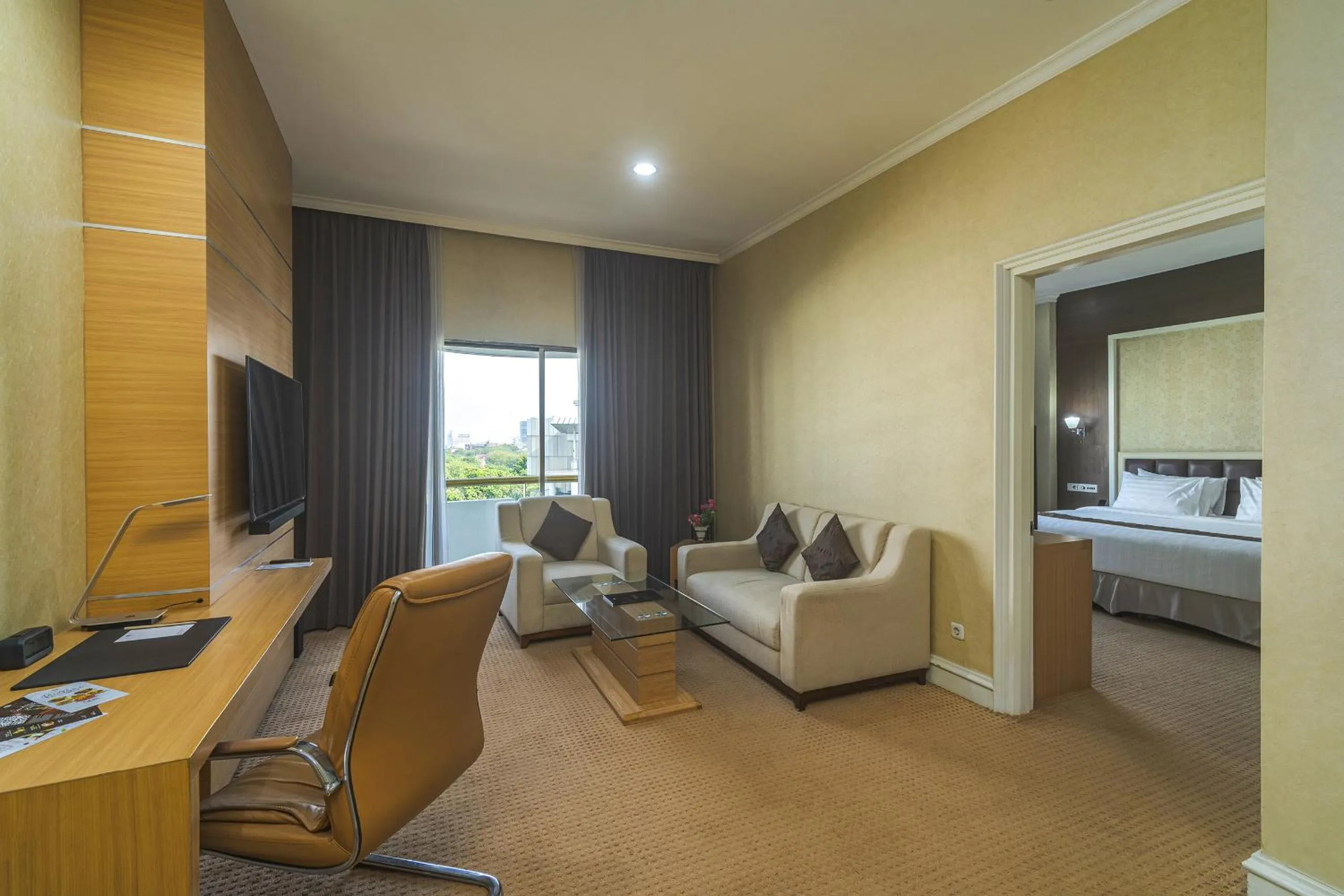 Living room in Surabaya Suites Hotel Powered by Archipelago