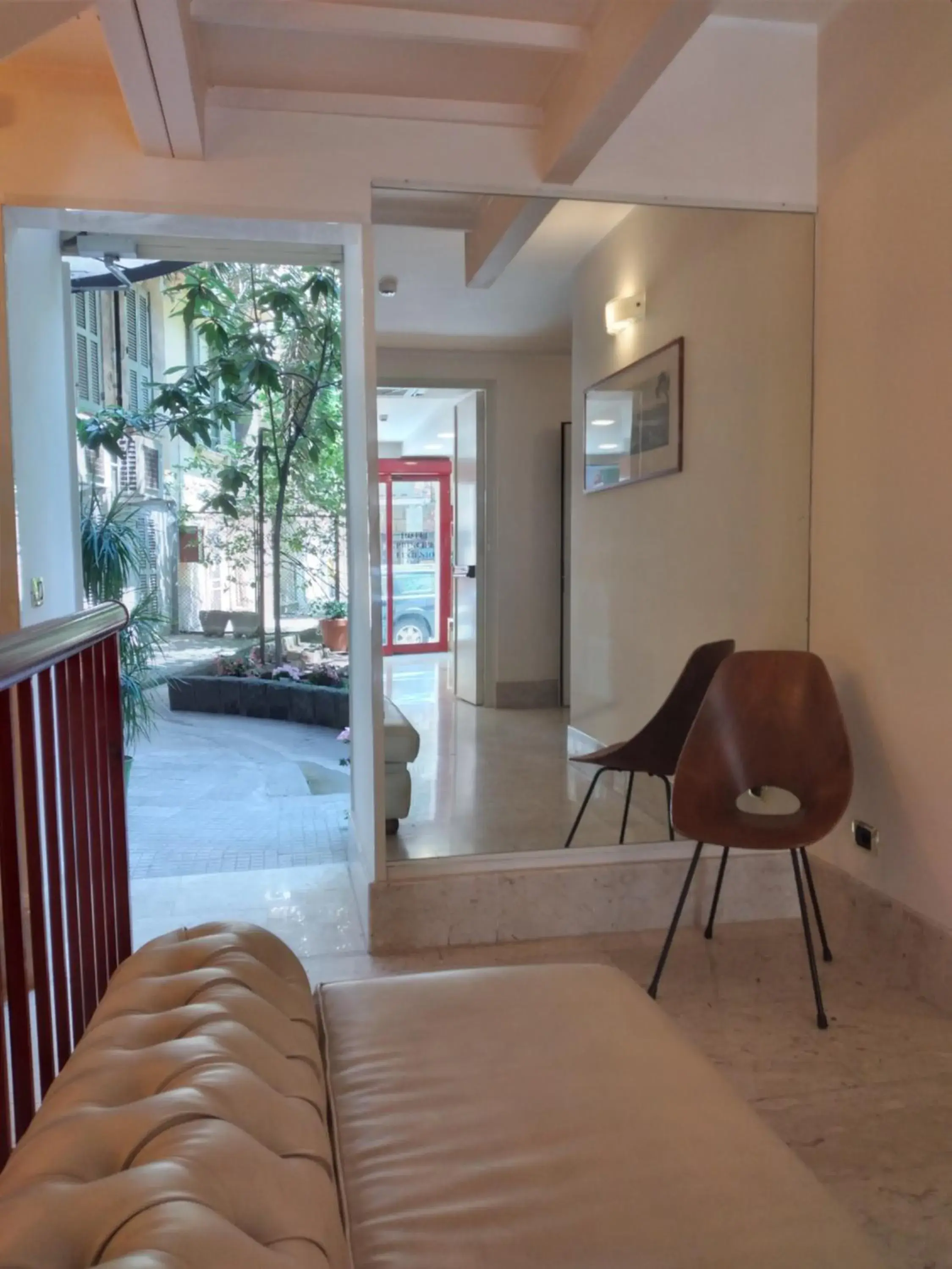 Inner courtyard view, Bed in Hotel Principe Eugenio Inner courtyard view, Bed in Hotel Principe Eugenio